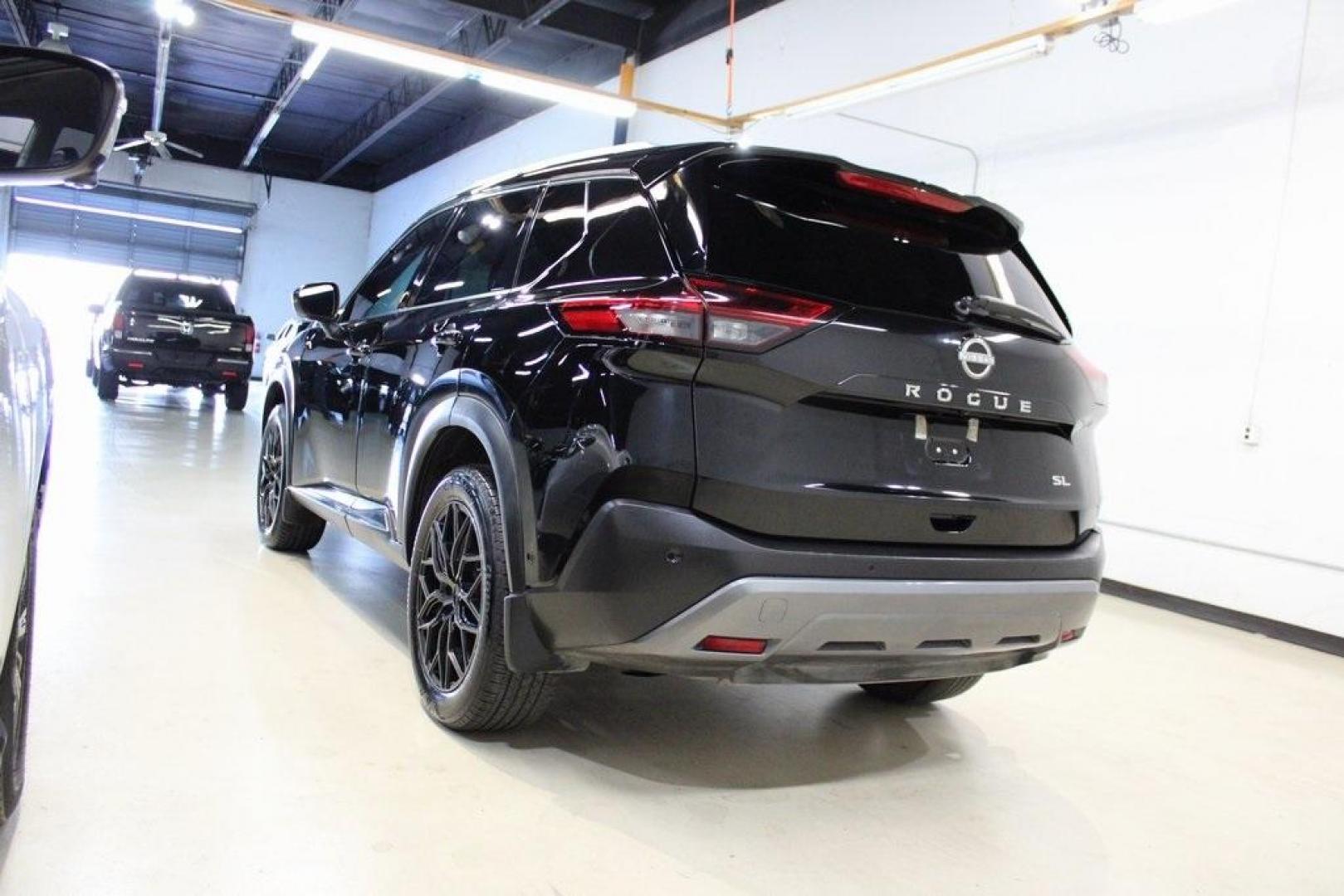2023 Super Black /Charcoal Nissan Rogue SL (5N1BT3CA6PC) with an 1.5L I3 Turbocharged DOHC 12V LEV3-ULEV50 201hp engine, CVT transmission, located at 15300 Midway Rd., Addison, TX, 75001, (972) 702-0011, 32.958321, -96.838074 - Photo#2