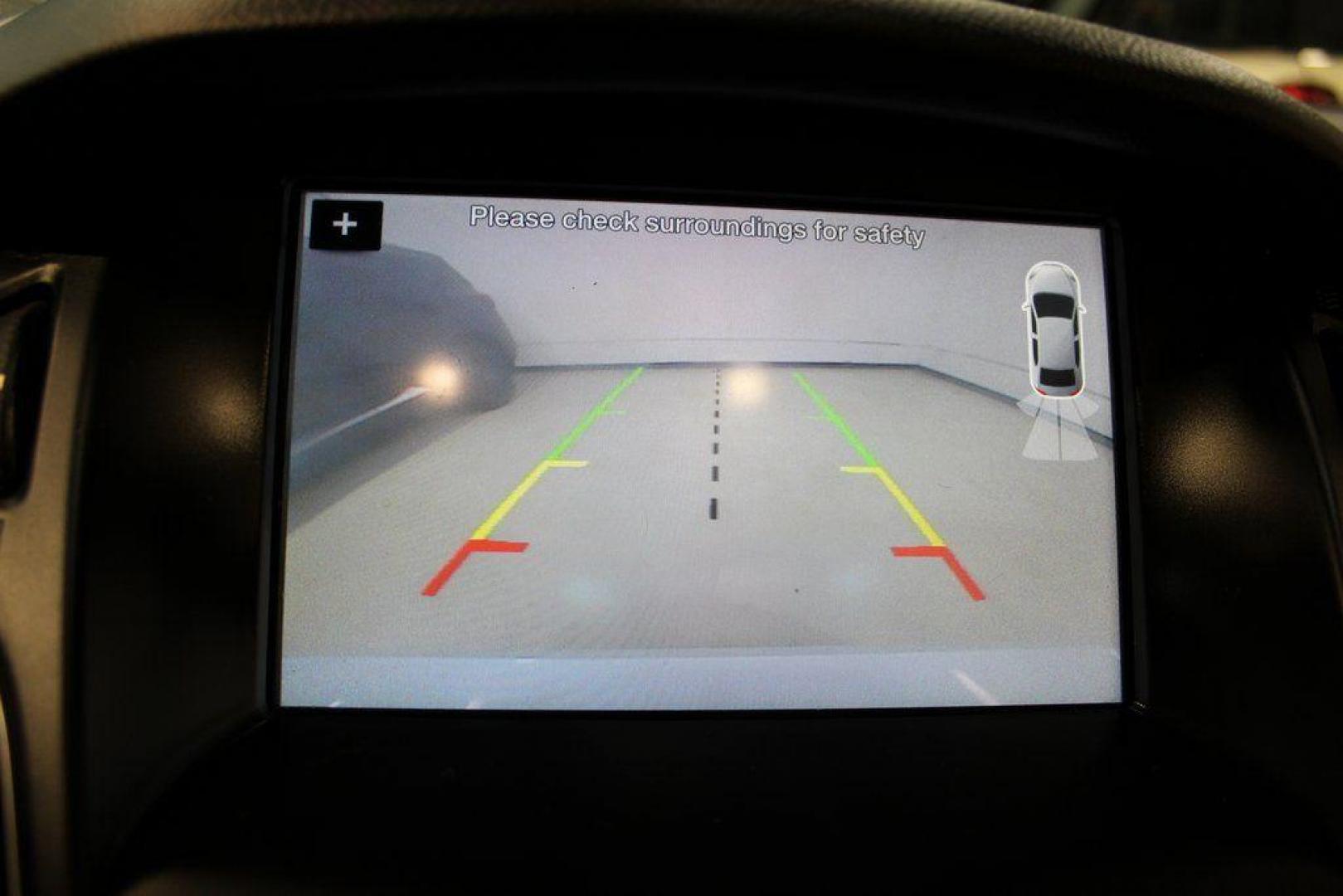 2016 White Platinum Clearcoat Metallic /Medium Soft Ceramic Ford Focus Titanium (1FADP3N2XGL) with an 2.0L I4 DGI Flex Fuel Ti-VCT engine, Automatic transmission, located at 15300 Midway Rd., Addison, TX, 75001, (972) 702-0011, 32.958321, -96.838074 - 2016 Ford Focus SE<br><br>Now Available at Midway Auto Group Addison, Texas<br><br>Efficient, comfortable, and versatilethe 2016 Ford Focus SE offers a great blend of fuel economy, modern technology, and everyday practicality. Whether you're commuting across DFW or looking for a reliable compact ca - Photo#15