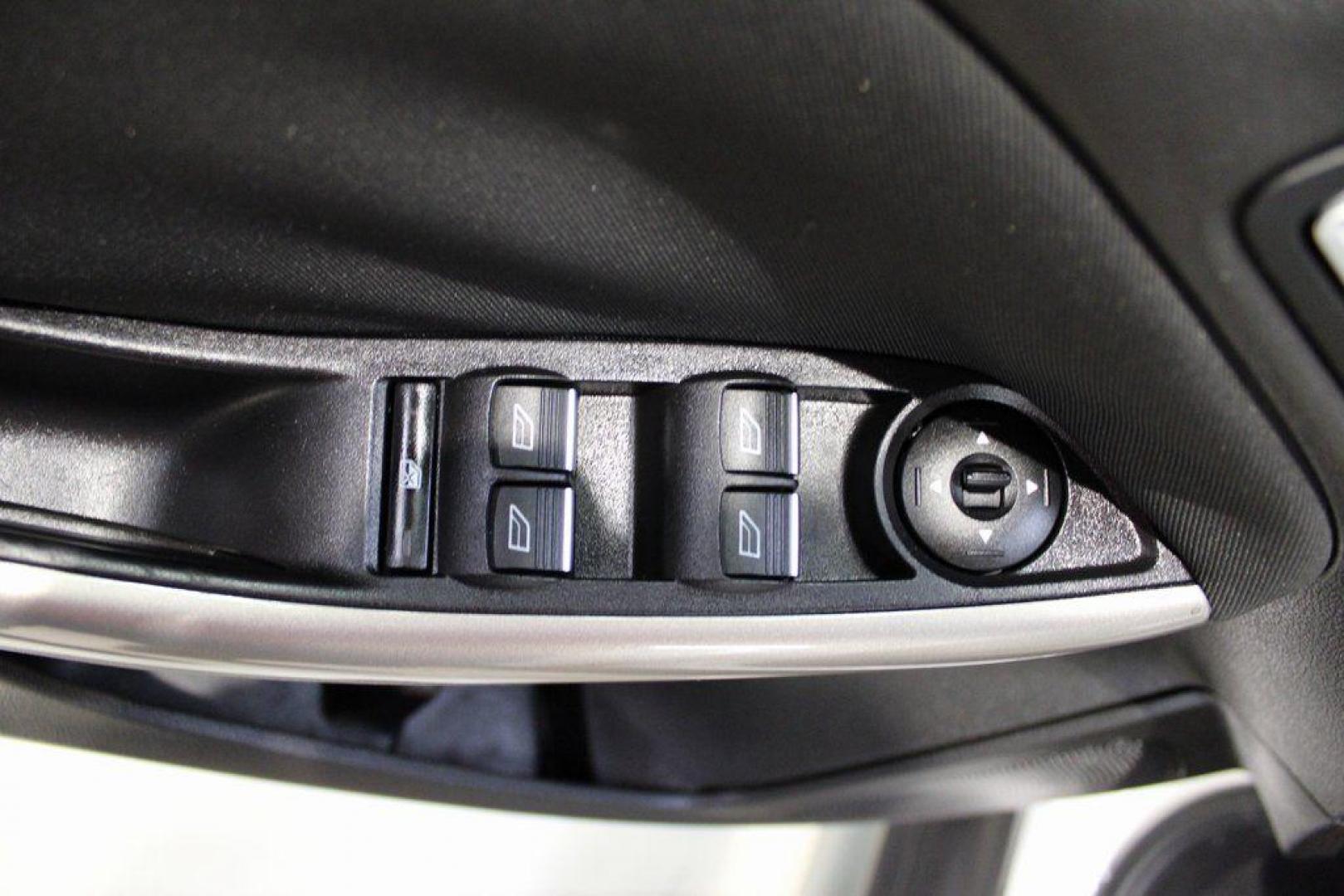 2016 White Platinum Clearcoat Metallic /Medium Soft Ceramic Ford Focus Titanium (1FADP3N2XGL) with an 2.0L I4 DGI Flex Fuel Ti-VCT engine, Automatic transmission, located at 15300 Midway Rd., Addison, TX, 75001, (972) 702-0011, 32.958321, -96.838074 - 2016 Ford Focus SE<br><br>Now Available at Midway Auto Group Addison, Texas<br><br>Efficient, comfortable, and versatilethe 2016 Ford Focus SE offers a great blend of fuel economy, modern technology, and everyday practicality. Whether you're commuting across DFW or looking for a reliable compact ca - Photo#22