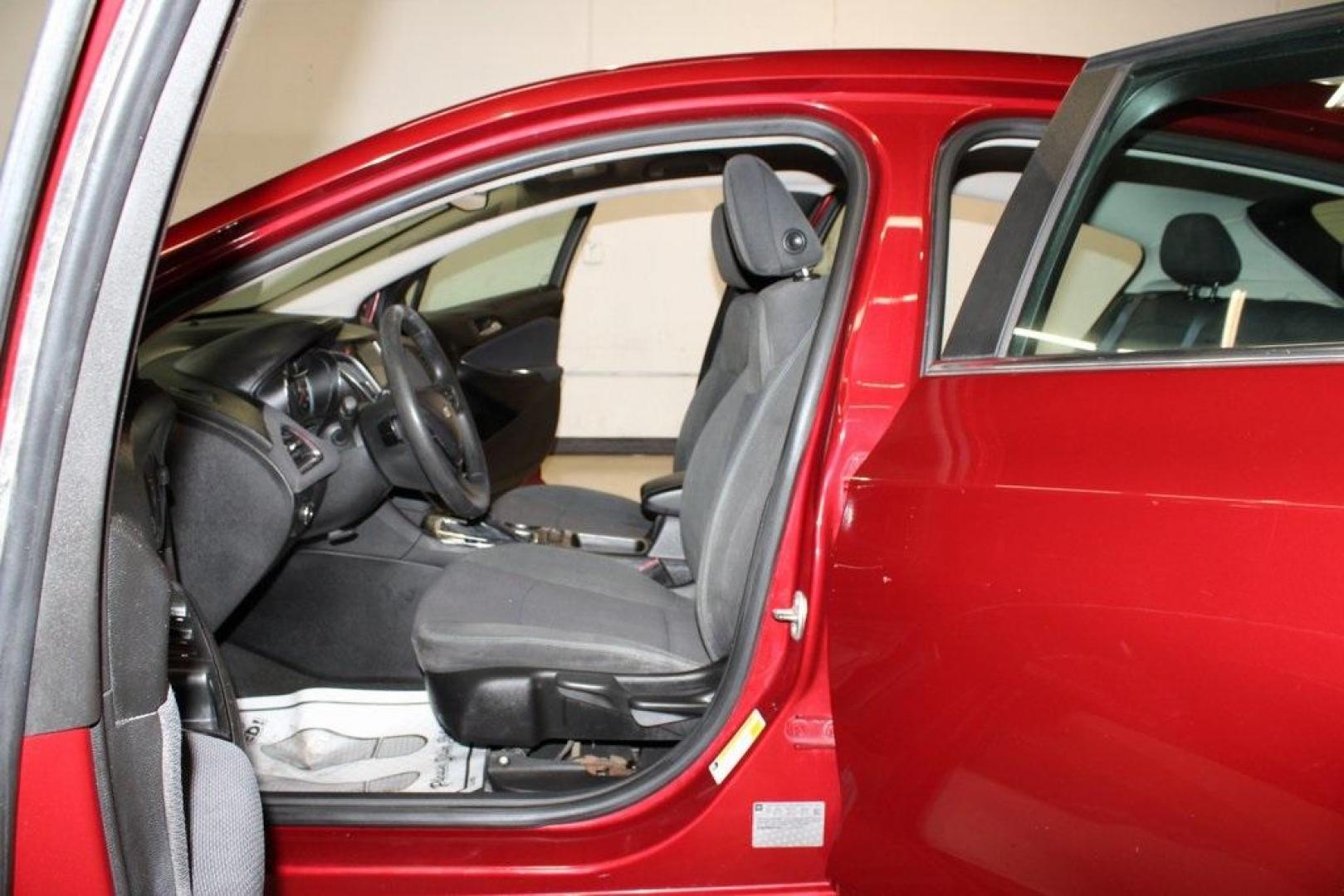 2017 Cajun Red Tintcoat /Black Chevrolet Cruze LT (3G1BE6SM8HS) with an 1.4L 4-Cylinder Turbo DOHC CVVT engine, Automatic transmission, located at 15300 Midway Rd., Addison, TX, 75001, (972) 702-0011, 32.958321, -96.838074 - 2017 Chevrolet Cruze Premier<br><br>Now Available at Midway Auto Group Addison, Texas<br><br>Comfortable, efficient, and surprisingly upscalethe 2017 Chevrolet Cruze Premier delivers a premium compact-sedan experience with modern technology, excellent fuel economy, and upgraded interior features. A - Photo#8