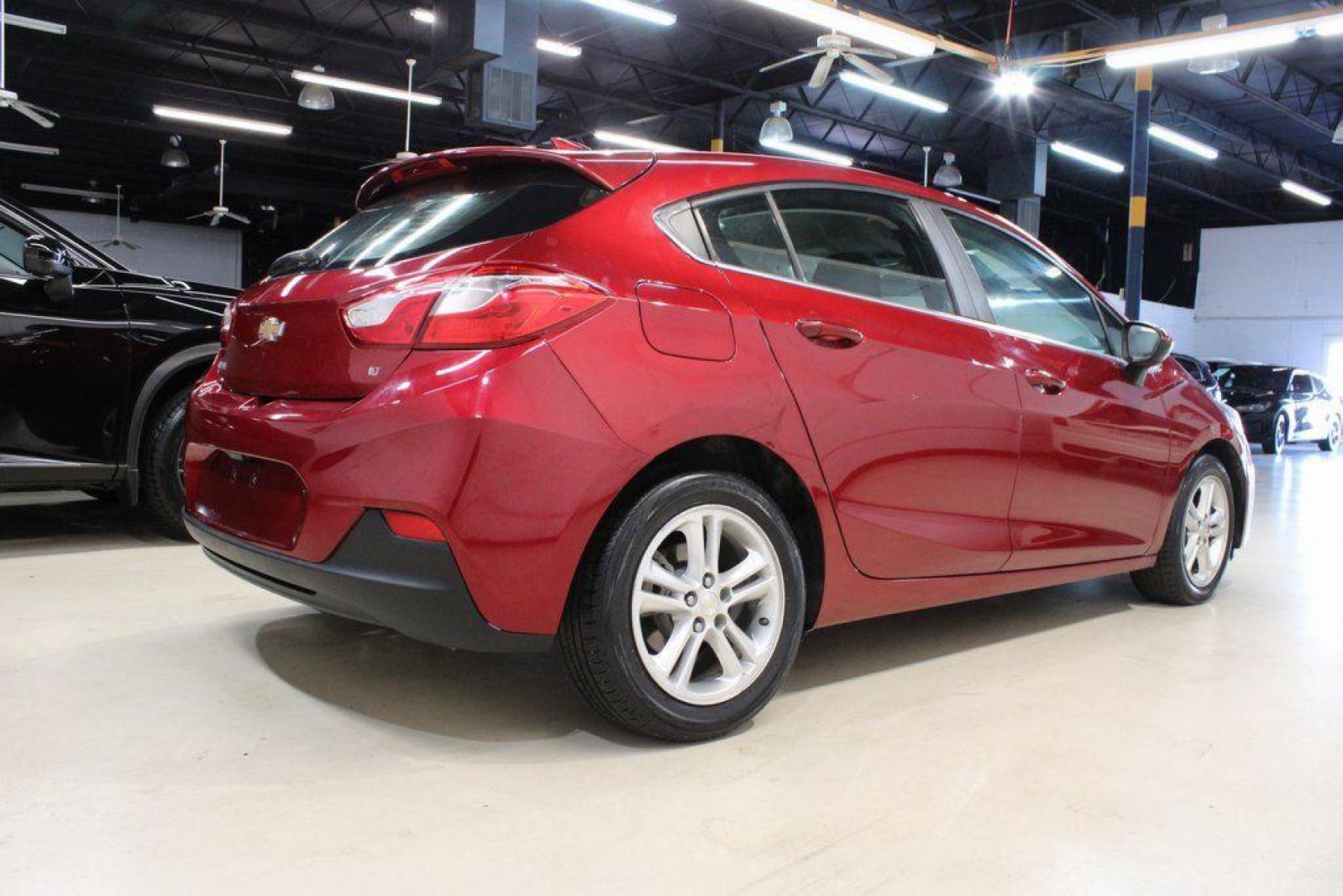 2017 Cajun Red Tintcoat /Black Chevrolet Cruze LT (3G1BE6SM8HS) with an 1.4L 4-Cylinder Turbo DOHC CVVT engine, Automatic transmission, located at 15300 Midway Rd., Addison, TX, 75001, (972) 702-0011, 32.958321, -96.838074 - Photo#2
