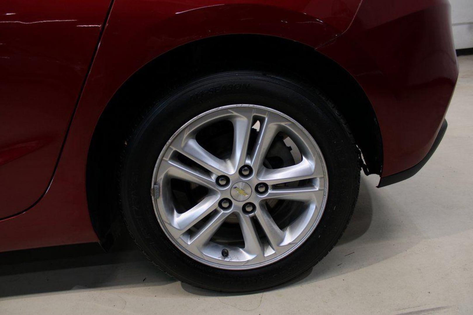 2017 Cajun Red Tintcoat /Black Chevrolet Cruze LT (3G1BE6SM8HS) with an 1.4L 4-Cylinder Turbo DOHC CVVT engine, Automatic transmission, located at 15300 Midway Rd., Addison, TX, 75001, (972) 702-0011, 32.958321, -96.838074 - Photo#5