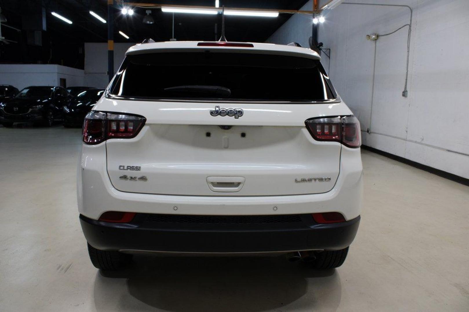 2021 White Clearcoat /Black Jeep Compass Limited (3C4NJDCB3MT) with an 2.4L I4 engine, Automatic transmission, located at 15300 Midway Rd., Addison, TX, 75001, (972) 702-0011, 32.958321, -96.838074 - 2021 Jeep Compass Limited 4x4<br><br>Now Available at Midway Auto Group Addison, Texas<br><br>Premium design, advanced technology, and true Jeep capability come together in the 2021 Jeep Compass Limited 4x4. As the top luxury trim in the Compass lineup, the Limited delivers upgraded materials, refi- Photo#6