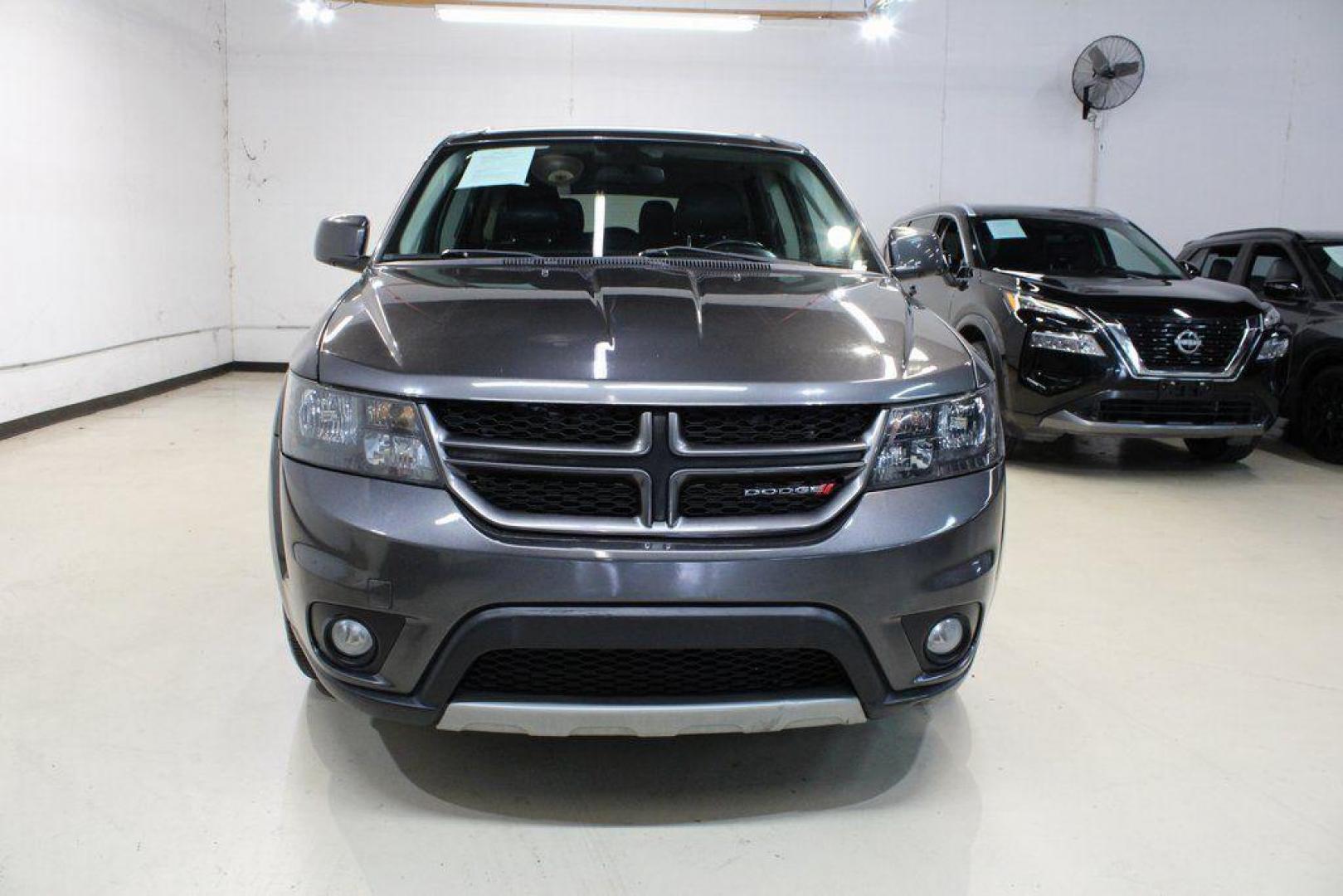 2018 Granite Crystal Metallic Clearcoat /Red Dodge Journey GT (3C4PDCEG0JT) with an 3.6L V6 24V VVT engine, Automatic transmission, located at 15300 Midway Rd., Addison, TX, 75001, (972) 702-0011, 32.958321, -96.838074 - 2018 Dodge Journey GT<br><br>Now Available at Midway Auto Group Addison, Texas<br><br>The 2018 Dodge Journey GT delivers a perfect blend of performance, comfort, and versatility. As the top trim level, the GT stands above the rest with premium interior materials, upgraded technology, and a powerful - Photo#4