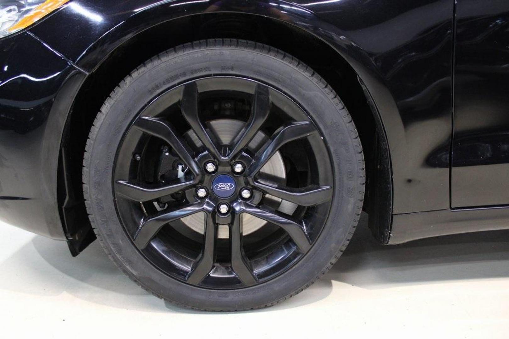 2019 Black /Light Putty Ford Fusion SE (3FA6P0HD1KR) with an 1.5L EcoBoost engine, Automatic transmission, located at 15300 Midway Rd., Addison, TX, 75001, (972) 702-0011, 32.958321, -96.838074 - Photo#8