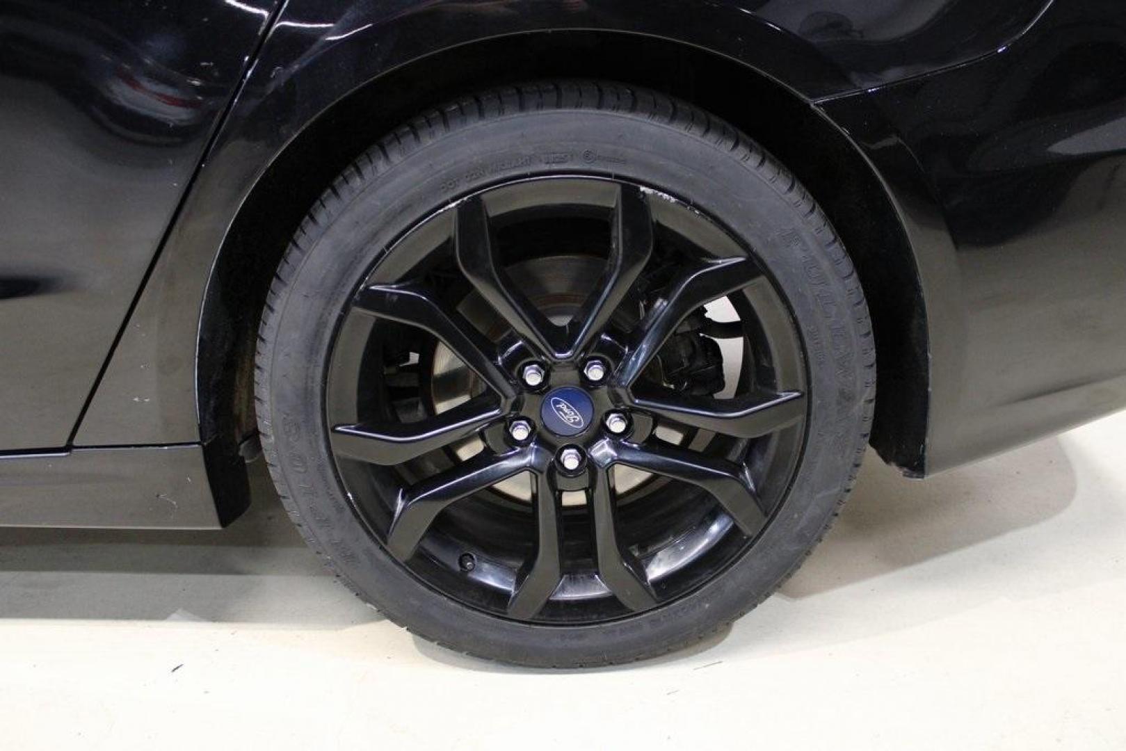 2019 Black /Light Putty Ford Fusion SE (3FA6P0HD1KR) with an 1.5L EcoBoost engine, Automatic transmission, located at 15300 Midway Rd., Addison, TX, 75001, (972) 702-0011, 32.958321, -96.838074 - Photo#9