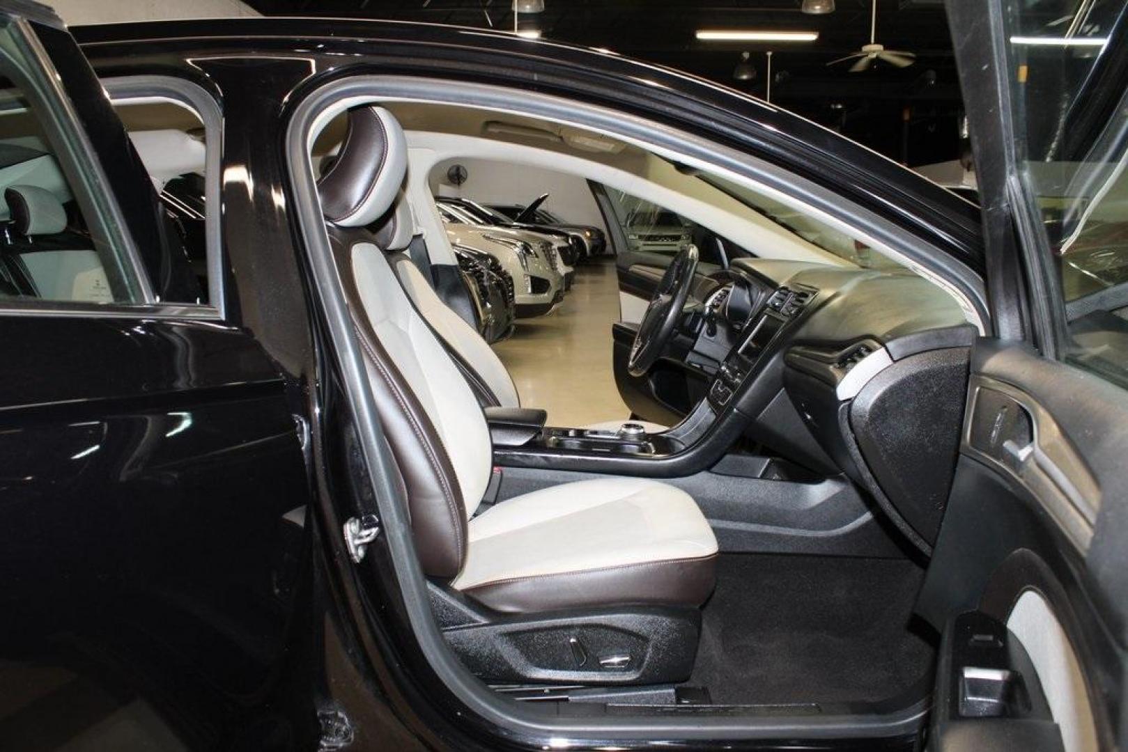 2019 Black /Light Putty Ford Fusion SE (3FA6P0HD1KR) with an 1.5L EcoBoost engine, Automatic transmission, located at 15300 Midway Rd., Addison, TX, 75001, (972) 702-0011, 32.958321, -96.838074 - Photo#13