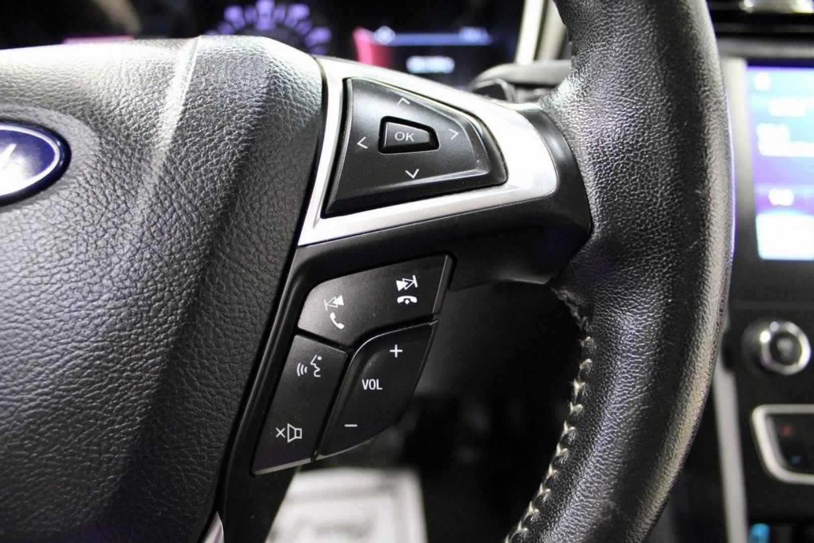 2019 Black /Light Putty Ford Fusion SE (3FA6P0HD1KR) with an 1.5L EcoBoost engine, Automatic transmission, located at 15300 Midway Rd., Addison, TX, 75001, (972) 702-0011, 32.958321, -96.838074 - Photo#24