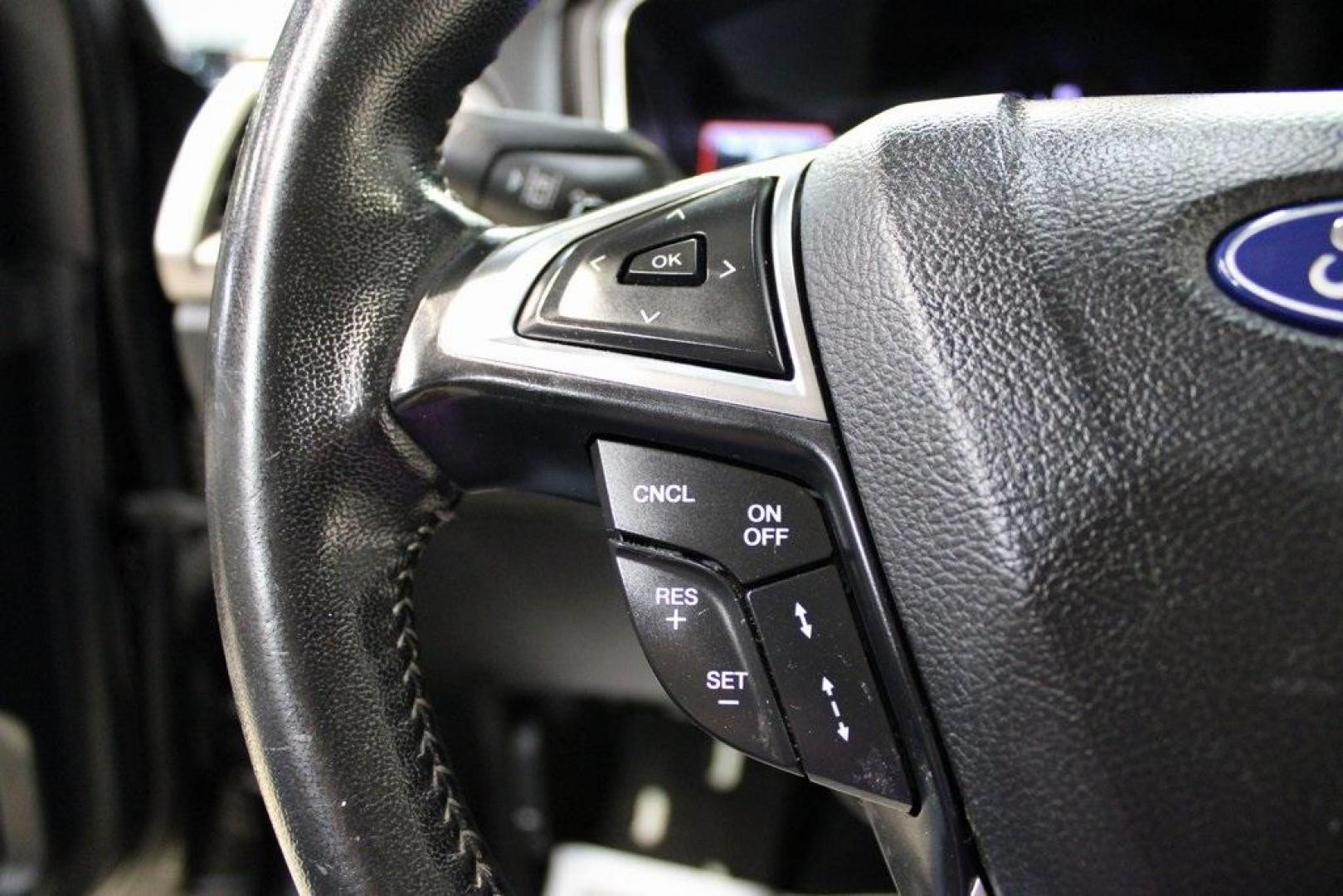 2019 Black /Light Putty Ford Fusion SE (3FA6P0HD1KR) with an 1.5L EcoBoost engine, Automatic transmission, located at 15300 Midway Rd., Addison, TX, 75001, (972) 702-0011, 32.958321, -96.838074 - Photo#25