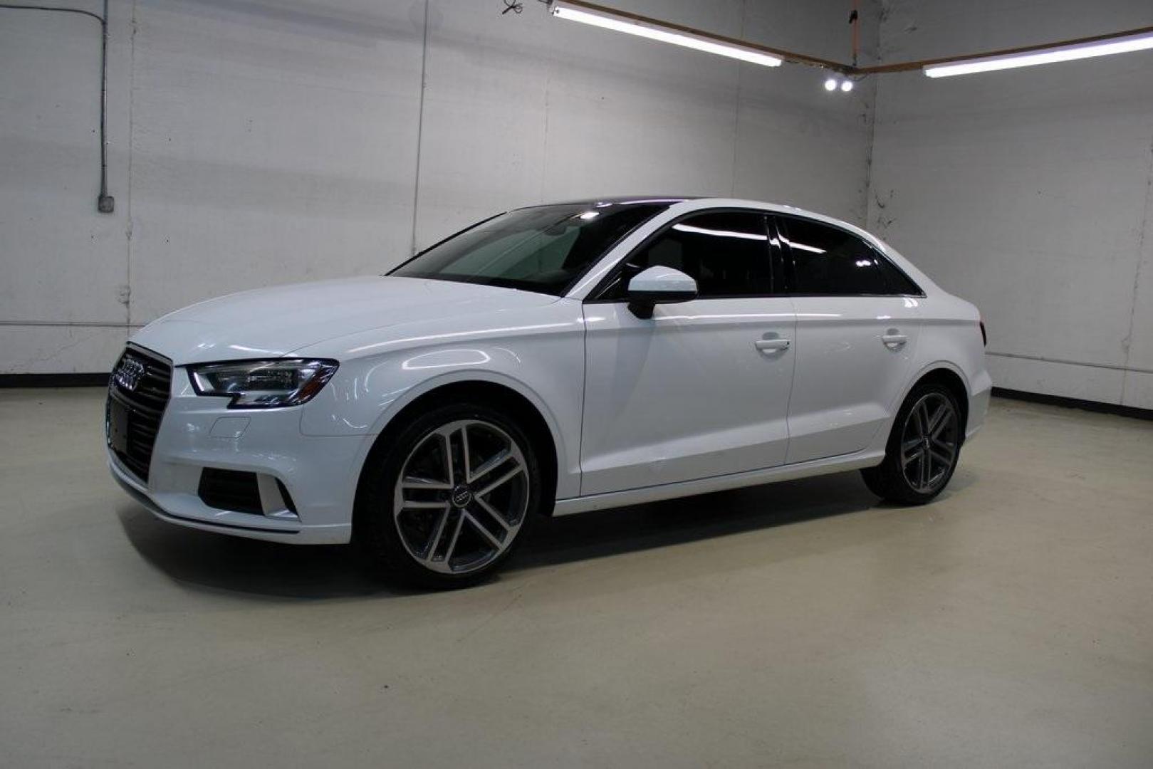 2017 Ibis White /Brown Audi A3 2.0T Premium (WAUAUGFF0H1) with an 2.0L 4-Cylinder TFSI engine, Automatic transmission, located at 15300 Midway Rd., Addison, TX, 75001, (972) 702-0011, 32.958321, -96.838074 - Photo#2