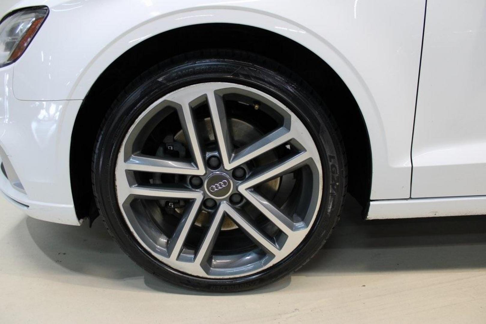 2017 Ibis White /Brown Audi A3 2.0T Premium (WAUAUGFF0H1) with an 2.0L 4-Cylinder TFSI engine, Automatic transmission, located at 15300 Midway Rd., Addison, TX, 75001, (972) 702-0011, 32.958321, -96.838074 - Photo#4