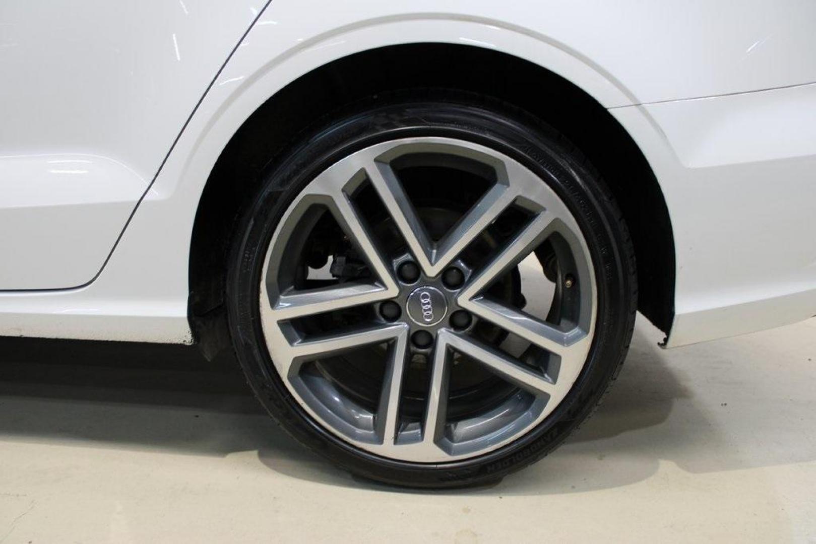 2017 Ibis White /Brown Audi A3 2.0T Premium (WAUAUGFF0H1) with an 2.0L 4-Cylinder TFSI engine, Automatic transmission, located at 15300 Midway Rd., Addison, TX, 75001, (972) 702-0011, 32.958321, -96.838074 - Photo#5