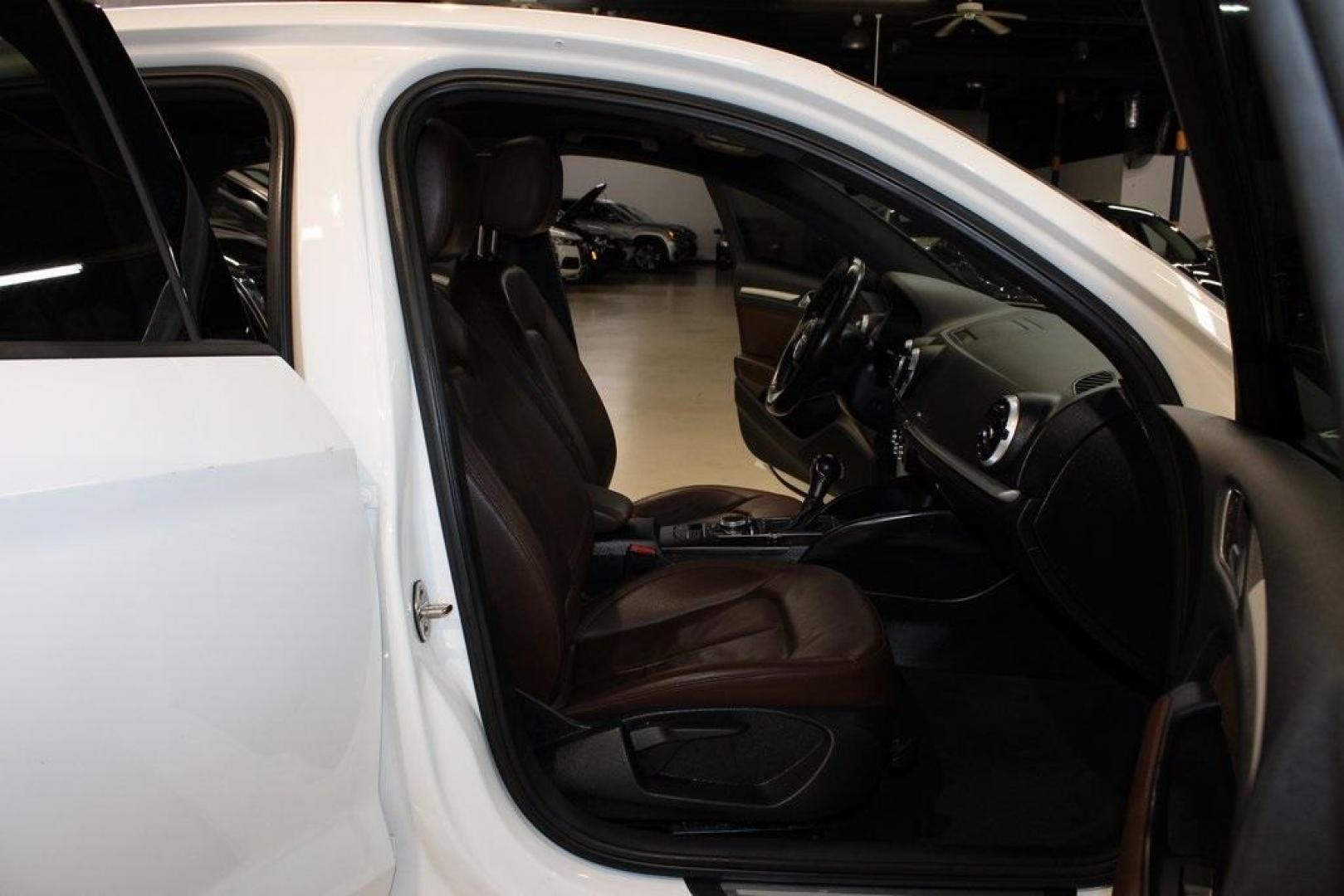 2017 Ibis White /Brown Audi A3 2.0T Premium (WAUAUGFF0H1) with an 2.0L 4-Cylinder TFSI engine, Automatic transmission, located at 15300 Midway Rd., Addison, TX, 75001, (972) 702-0011, 32.958321, -96.838074 - Photo#9