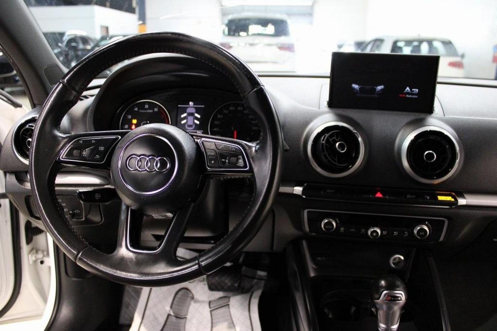 2017 Ibis White /Brown Audi A3 2.0T Premium (WAUAUGFF0H1) with an 2.0L 4-Cylinder TFSI engine, Automatic transmission, located at 15300 Midway Rd., Addison, TX, 75001, (972) 702-0011, 32.958321, -96.838074 - Photo#12