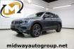 2018 Platinum Gray Metallic /Titan Black Volkswagen Tiguan 2.0T SEL (3VV2B7AX3JM) with an 2.0L TSI DOHC engine, Automatic transmission, located at 15300 Midway Rd., Addison, TX, 75001, (972) 702-0011, 32.958321, -96.838074 - 2018 Volkswagen Tiguan SEL 4MOTION<br><br>Now Available at Midway Auto Group Addison, Texas<br><br>Spacious, capable, and engineered for everyday versatilitythe 2018 Volkswagen Tiguan S 4MOTION offers three-row flexibility, a smooth turbocharged drive, and the confidence of VWs advanced all-wheel-d - Photo#0