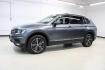 2018 Platinum Gray Metallic /Titan Black Volkswagen Tiguan 2.0T SEL (3VV2B7AX3JM) with an 2.0L TSI DOHC engine, Automatic transmission, located at 15300 Midway Rd., Addison, TX, 75001, (972) 702-0011, 32.958321, -96.838074 - 2018 Volkswagen Tiguan SEL 4MOTION<br><br>Now Available at Midway Auto Group Addison, Texas<br><br>Spacious, capable, and engineered for everyday versatilitythe 2018 Volkswagen Tiguan S 4MOTION offers three-row flexibility, a smooth turbocharged drive, and the confidence of VWs advanced all-wheel-d - Photo#4