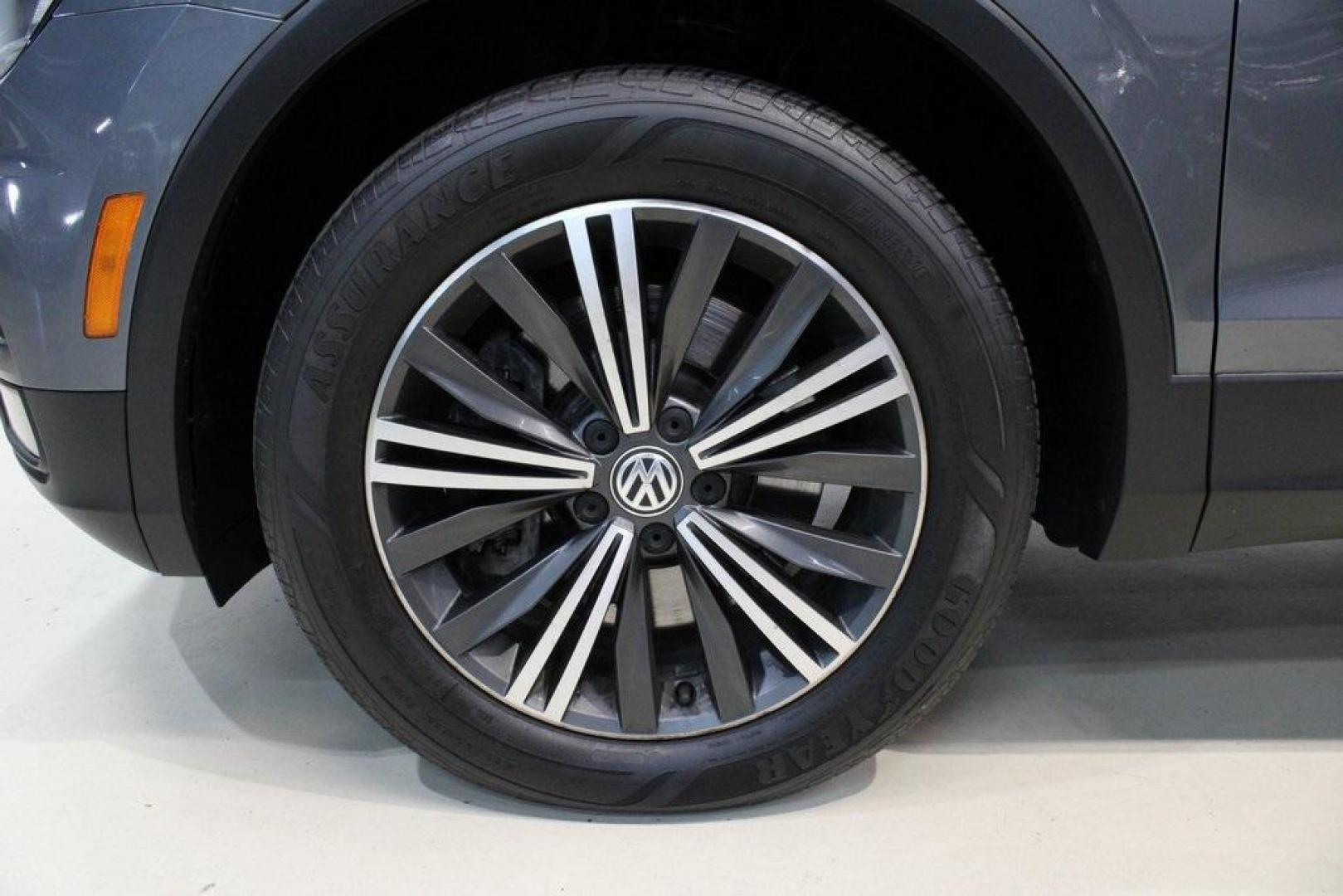 2018 Platinum Gray Metallic /Titan Black Volkswagen Tiguan 2.0T SEL (3VV2B7AX3JM) with an 2.0L TSI DOHC engine, Automatic transmission, located at 15300 Midway Rd., Addison, TX, 75001, (972) 702-0011, 32.958321, -96.838074 - 2018 Volkswagen Tiguan SEL 4MOTION<br><br>Now Available at Midway Auto Group Addison, Texas<br><br>Spacious, capable, and engineered for everyday versatilitythe 2018 Volkswagen Tiguan S 4MOTION offers three-row flexibility, a smooth turbocharged drive, and the confidence of VWs advanced all-wheel-d - Photo#8