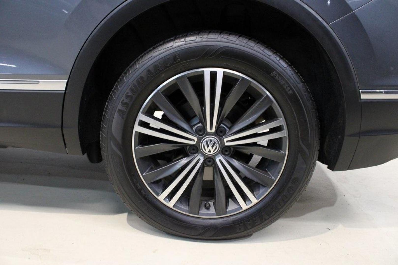 2018 Platinum Gray Metallic /Titan Black Volkswagen Tiguan 2.0T SEL (3VV2B7AX3JM) with an 2.0L TSI DOHC engine, Automatic transmission, located at 15300 Midway Rd., Addison, TX, 75001, (972) 702-0011, 32.958321, -96.838074 - 2018 Volkswagen Tiguan SEL 4MOTION<br><br>Now Available at Midway Auto Group Addison, Texas<br><br>Spacious, capable, and engineered for everyday versatilitythe 2018 Volkswagen Tiguan S 4MOTION offers three-row flexibility, a smooth turbocharged drive, and the confidence of VWs advanced all-wheel-d - Photo#9