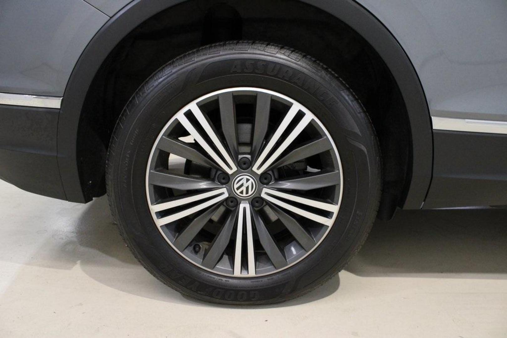 2018 Platinum Gray Metallic /Titan Black Volkswagen Tiguan 2.0T SEL (3VV2B7AX3JM) with an 2.0L TSI DOHC engine, Automatic transmission, located at 15300 Midway Rd., Addison, TX, 75001, (972) 702-0011, 32.958321, -96.838074 - 2018 Volkswagen Tiguan SEL 4MOTION<br><br>Now Available at Midway Auto Group Addison, Texas<br><br>Spacious, capable, and engineered for everyday versatilitythe 2018 Volkswagen Tiguan S 4MOTION offers three-row flexibility, a smooth turbocharged drive, and the confidence of VWs advanced all-wheel-d - Photo#10