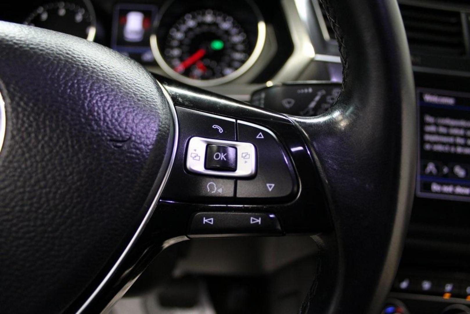 2018 Platinum Gray Metallic /Titan Black Volkswagen Tiguan 2.0T SEL (3VV2B7AX3JM) with an 2.0L TSI DOHC engine, Automatic transmission, located at 15300 Midway Rd., Addison, TX, 75001, (972) 702-0011, 32.958321, -96.838074 - 2018 Volkswagen Tiguan SEL 4MOTION<br><br>Now Available at Midway Auto Group Addison, Texas<br><br>Spacious, capable, and engineered for everyday versatilitythe 2018 Volkswagen Tiguan S 4MOTION offers three-row flexibility, a smooth turbocharged drive, and the confidence of VWs advanced all-wheel-d - Photo#21