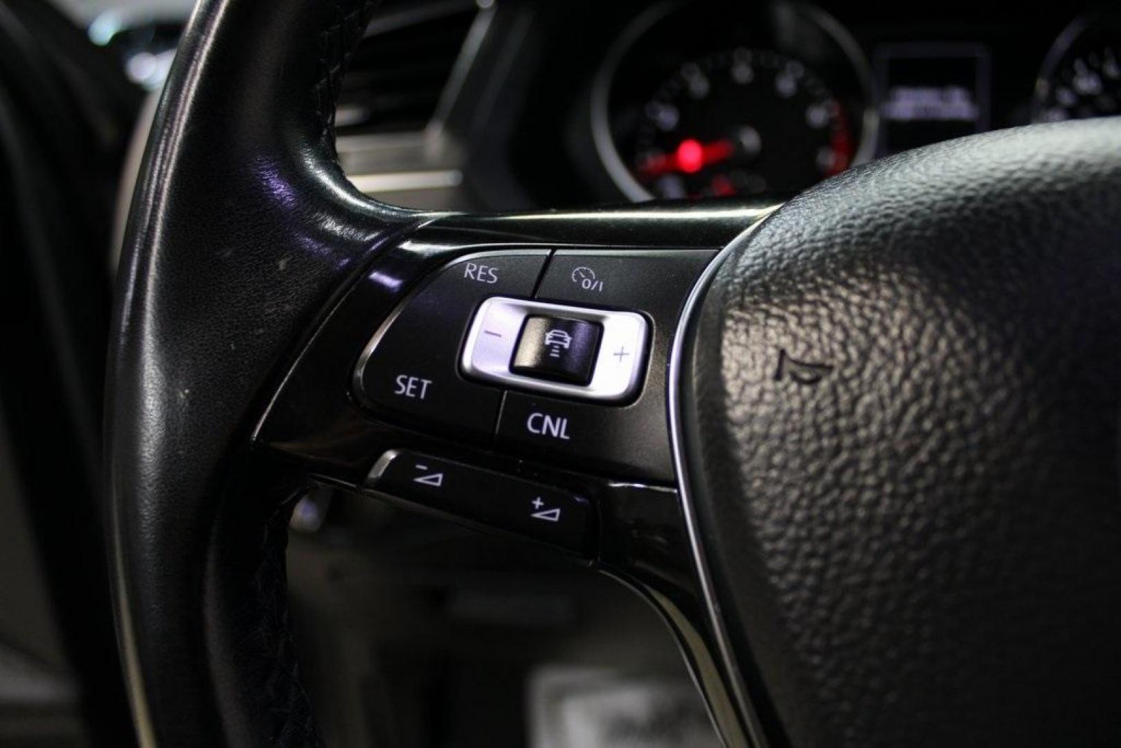 2018 Platinum Gray Metallic /Titan Black Volkswagen Tiguan 2.0T SEL (3VV2B7AX3JM) with an 2.0L TSI DOHC engine, Automatic transmission, located at 15300 Midway Rd., Addison, TX, 75001, (972) 702-0011, 32.958321, -96.838074 - 2018 Volkswagen Tiguan SEL 4MOTION<br><br>Now Available at Midway Auto Group Addison, Texas<br><br>Spacious, capable, and engineered for everyday versatilitythe 2018 Volkswagen Tiguan S 4MOTION offers three-row flexibility, a smooth turbocharged drive, and the confidence of VWs advanced all-wheel-d - Photo#22