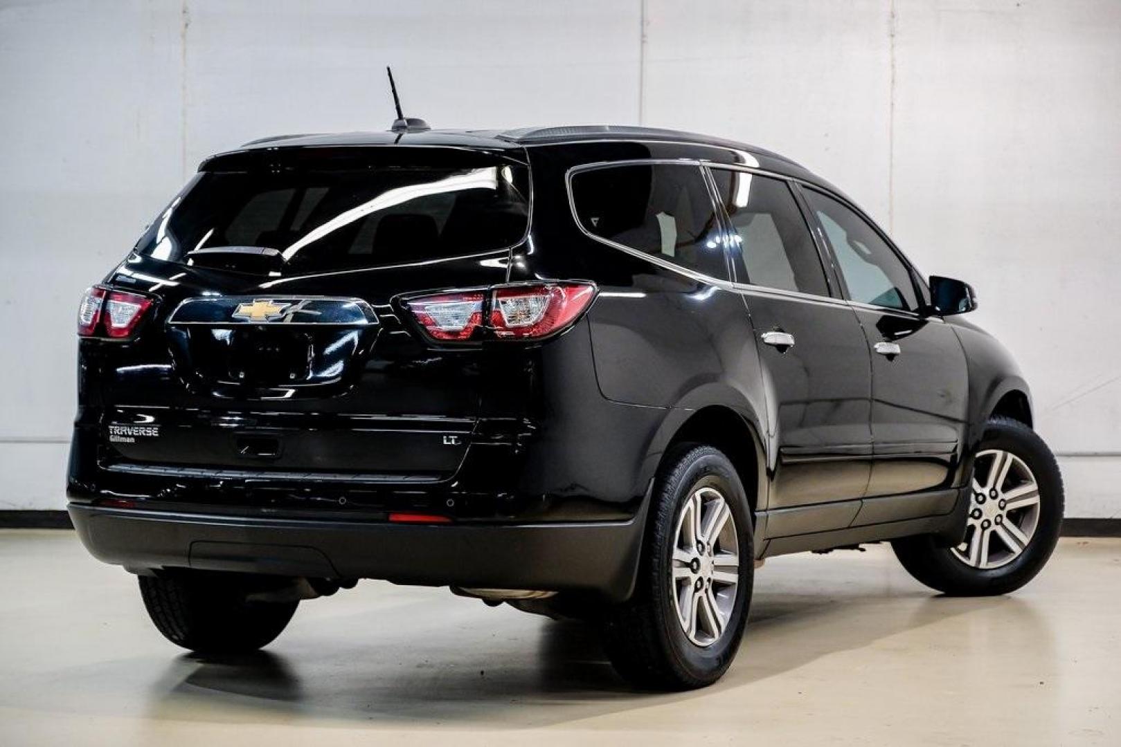 2017 Mosaic Black Metallic /Ebony/Saddle Up Chevrolet Traverse LT (1GNKRGKD3HJ) with an 3.6L V6 SIDI engine, Automatic transmission, located at 15300 Midway Rd., Addison, TX, 75001, (972) 702-0011, 32.958321, -96.838074 - Photo#9