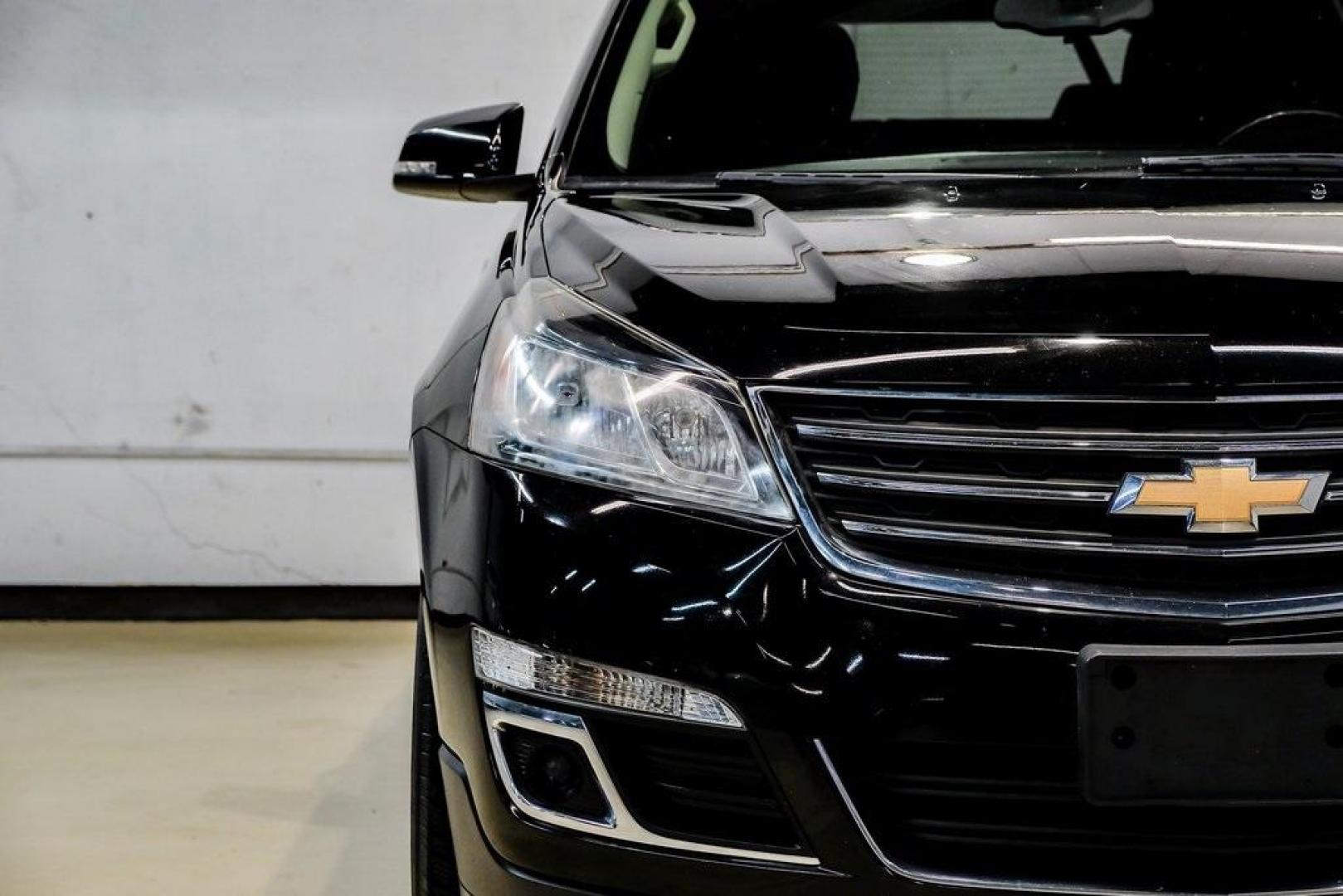 2017 Mosaic Black Metallic /Ebony/Saddle Up Chevrolet Traverse LT (1GNKRGKD3HJ) with an 3.6L V6 SIDI engine, Automatic transmission, located at 15300 Midway Rd., Addison, TX, 75001, (972) 702-0011, 32.958321, -96.838074 - Photo#49