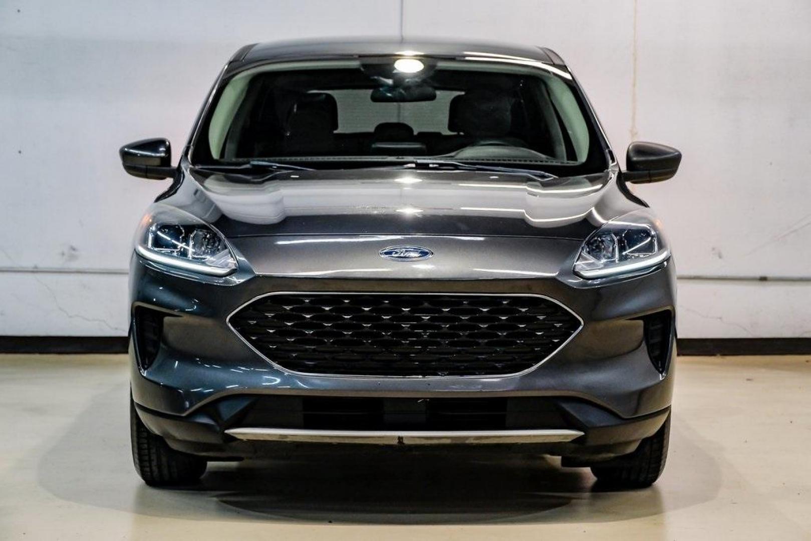 2020 Magnetic /Ebony Ford Escape SE (1FMCU0G64LU) with an 1.5L EcoBoost engine, Automatic transmission, located at 15300 Midway Rd., Addison, TX, 75001, (972) 702-0011, 32.958321, -96.838074 - Photo#6