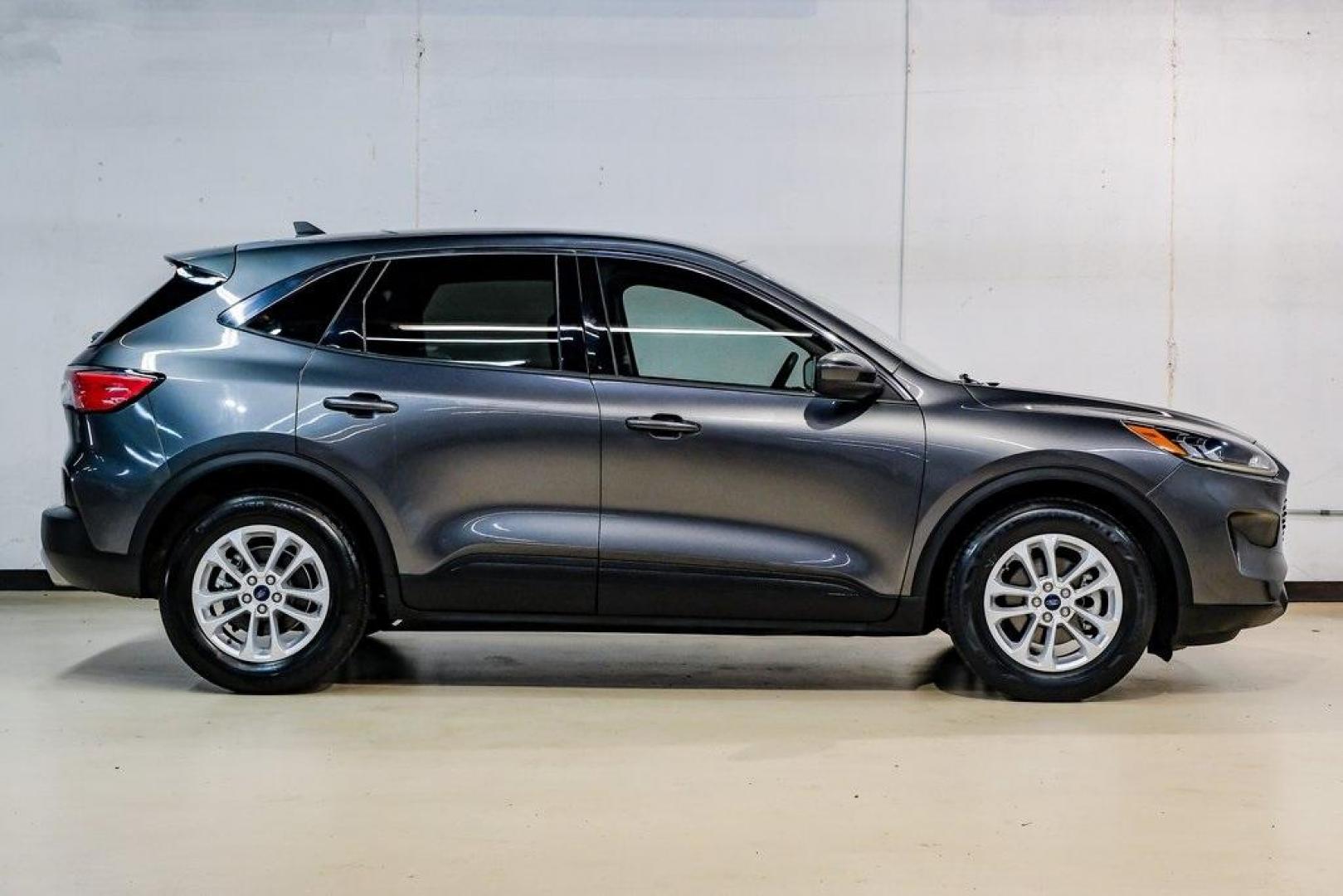 2020 Magnetic /Ebony Ford Escape SE (1FMCU0G64LU) with an 1.5L EcoBoost engine, Automatic transmission, located at 15300 Midway Rd., Addison, TX, 75001, (972) 702-0011, 32.958321, -96.838074 - Photo#8