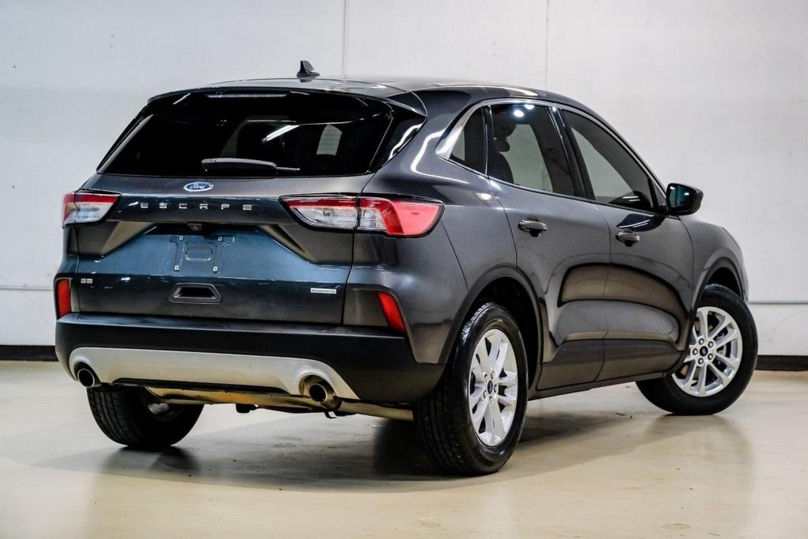 2020 Magnetic /Ebony Ford Escape SE (1FMCU0G64LU) with an 1.5L EcoBoost engine, Automatic transmission, located at 15300 Midway Rd., Addison, TX, 75001, (972) 702-0011, 32.958321, -96.838074 - Photo#9