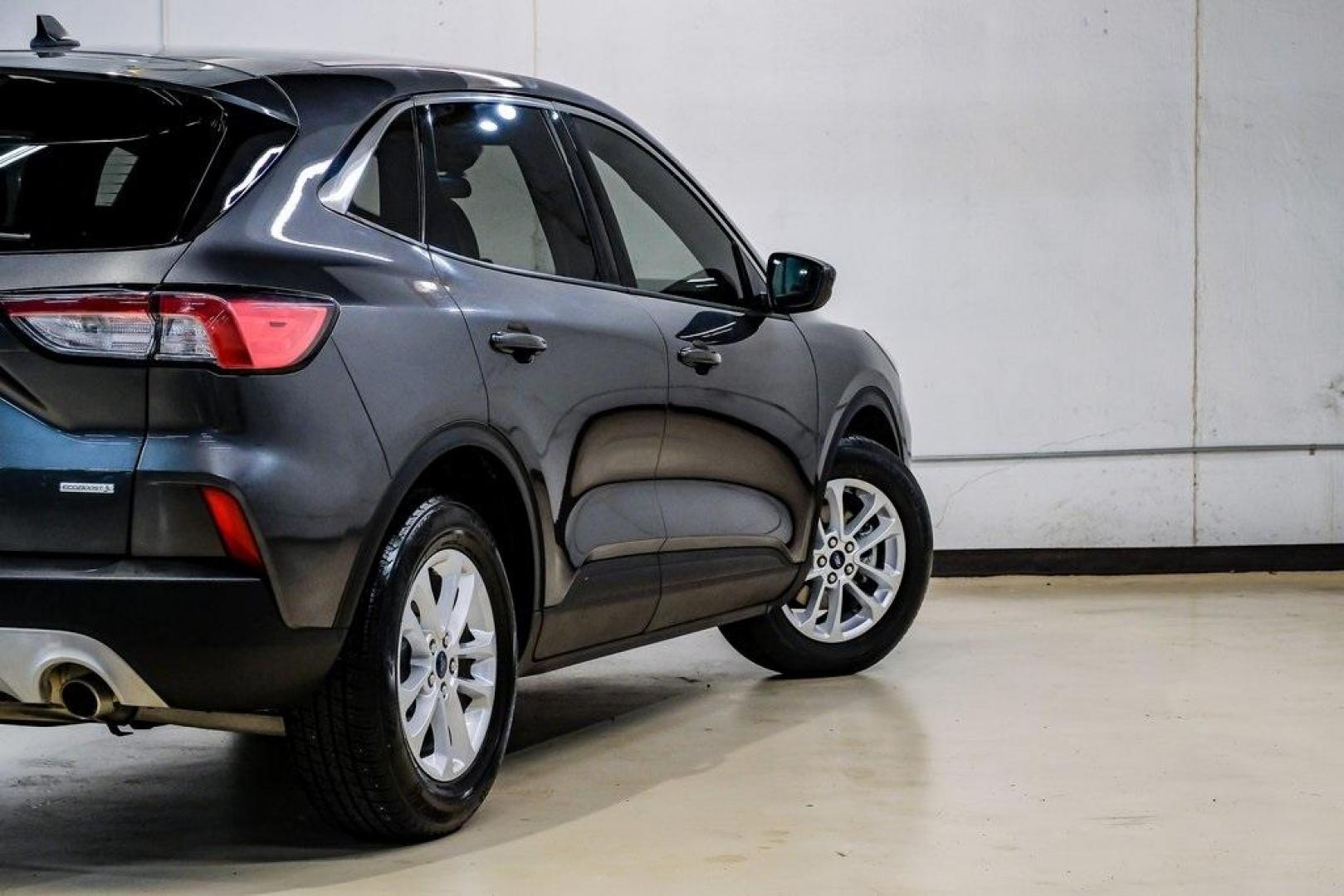 2020 Magnetic /Ebony Ford Escape SE (1FMCU0G64LU) with an 1.5L EcoBoost engine, Automatic transmission, located at 15300 Midway Rd., Addison, TX, 75001, (972) 702-0011, 32.958321, -96.838074 - Photo#11