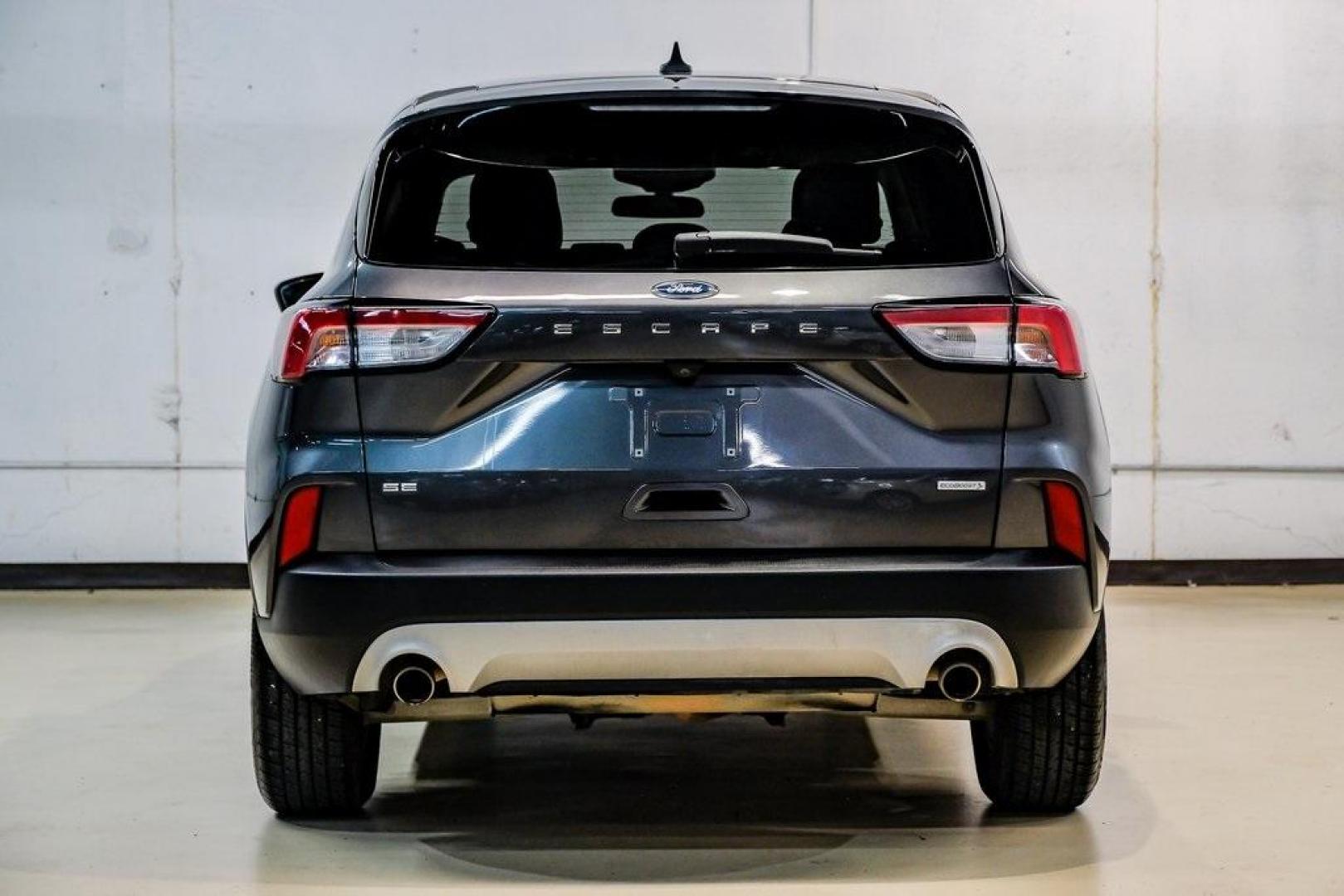 2020 Magnetic /Ebony Ford Escape SE (1FMCU0G64LU) with an 1.5L EcoBoost engine, Automatic transmission, located at 15300 Midway Rd., Addison, TX, 75001, (972) 702-0011, 32.958321, -96.838074 - Photo#12