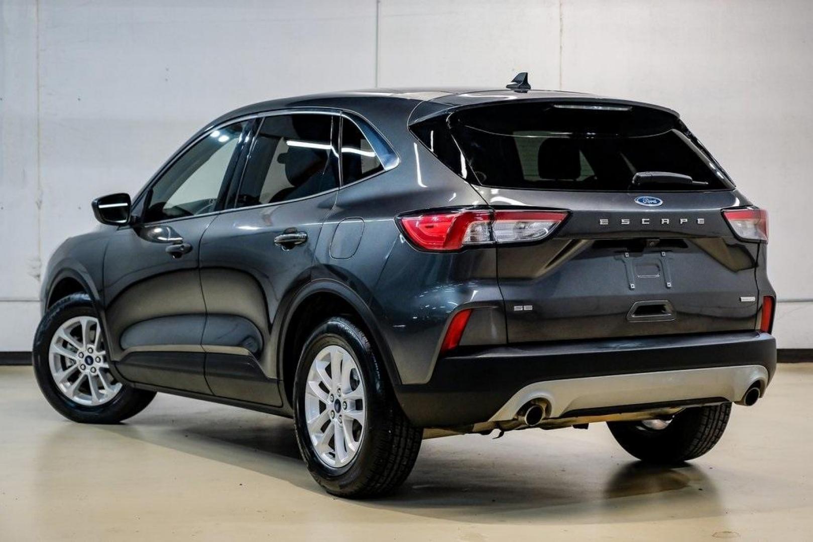 2020 Magnetic /Ebony Ford Escape SE (1FMCU0G64LU) with an 1.5L EcoBoost engine, Automatic transmission, located at 15300 Midway Rd., Addison, TX, 75001, (972) 702-0011, 32.958321, -96.838074 - Photo#13