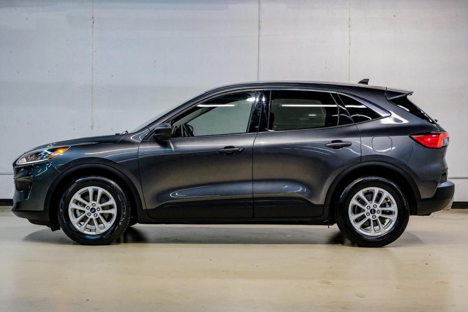 2020 Magnetic /Ebony Ford Escape SE (1FMCU0G64LU) with an 1.5L EcoBoost engine, Automatic transmission, located at 15300 Midway Rd., Addison, TX, 75001, (972) 702-0011, 32.958321, -96.838074 - Photo#14