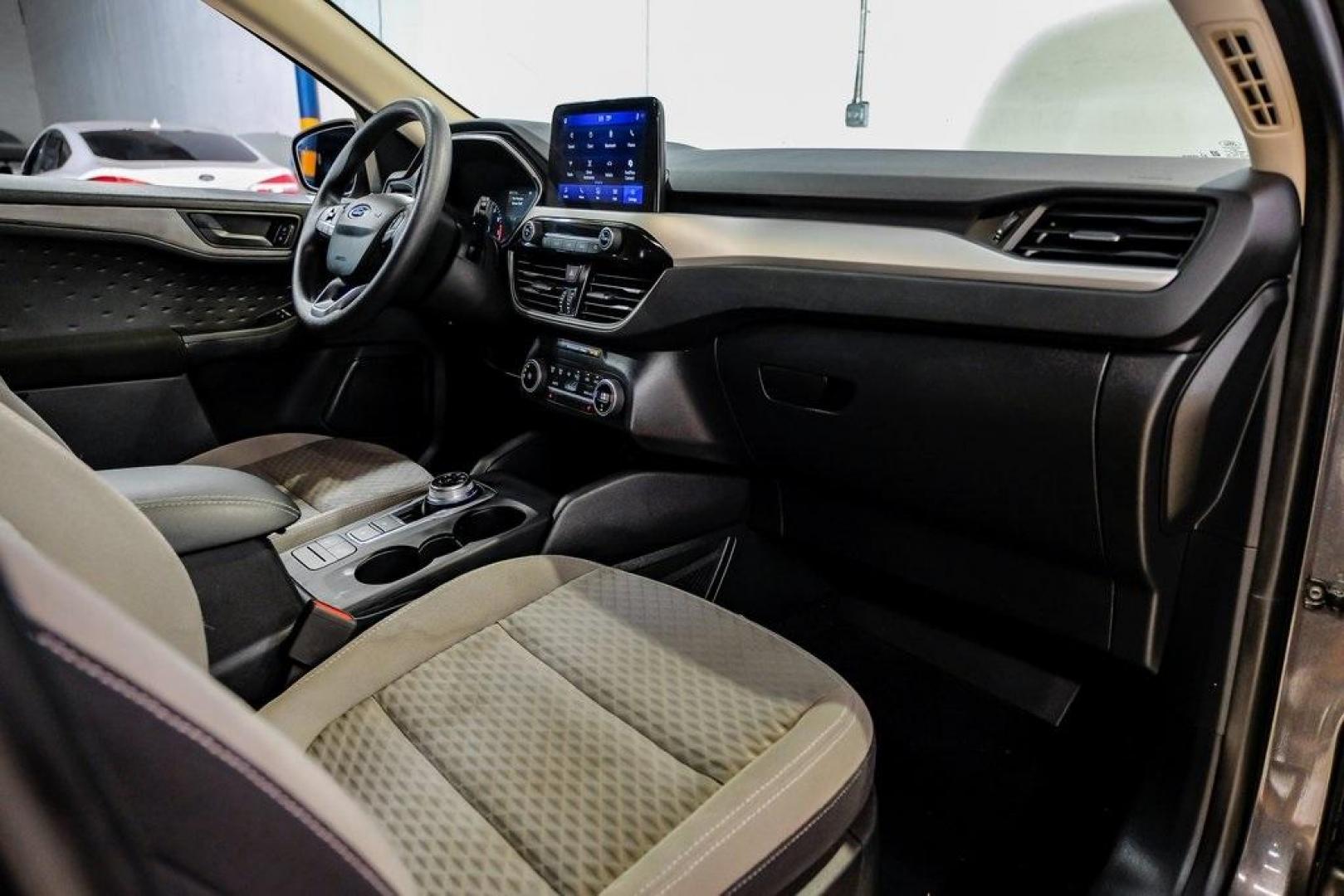 2020 Magnetic /Ebony Ford Escape SE (1FMCU0G64LU) with an 1.5L EcoBoost engine, Automatic transmission, located at 15300 Midway Rd., Addison, TX, 75001, (972) 702-0011, 32.958321, -96.838074 - Photo#17