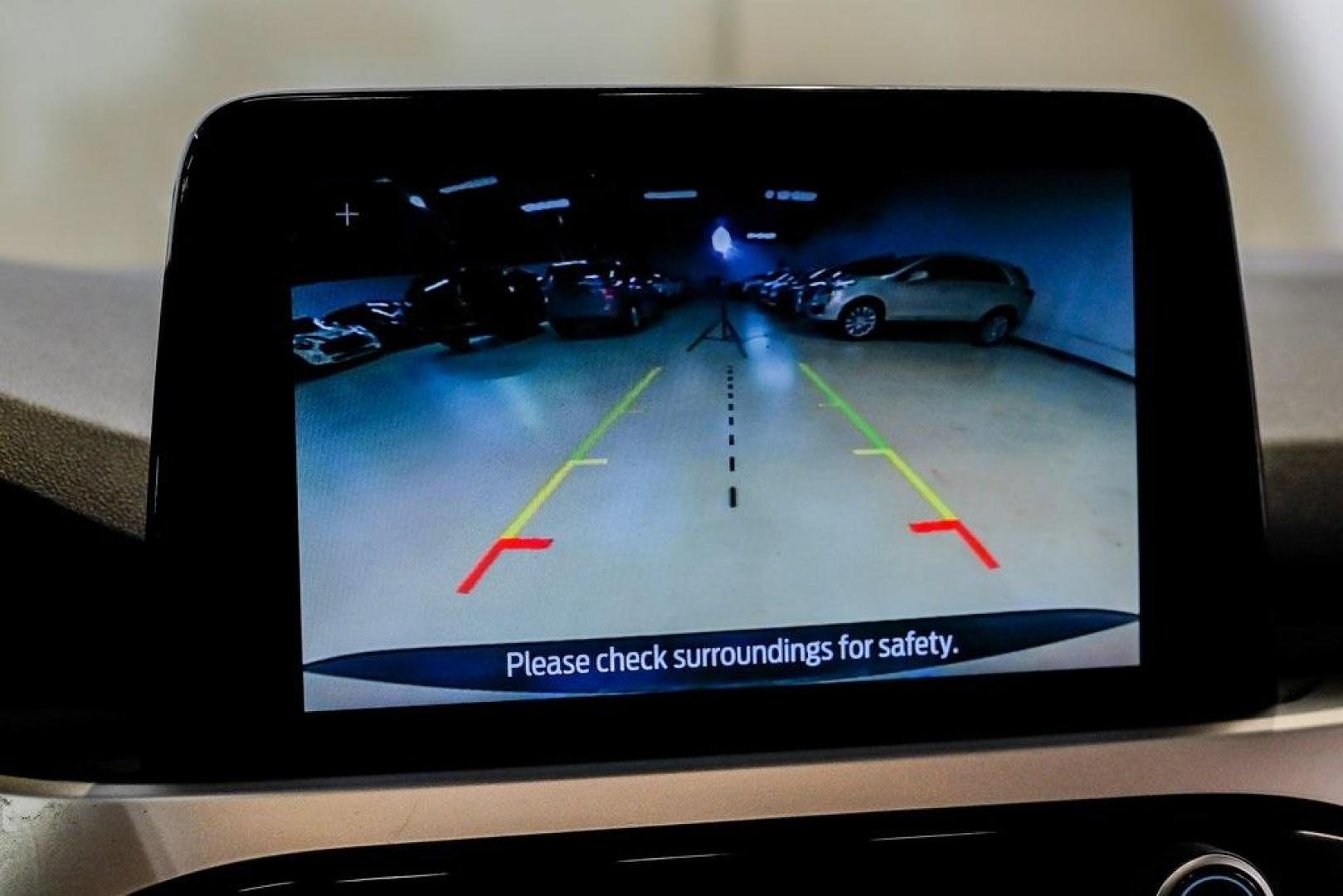 2020 Magnetic /Ebony Ford Escape SE (1FMCU0G64LU) with an 1.5L EcoBoost engine, Automatic transmission, located at 15300 Midway Rd., Addison, TX, 75001, (972) 702-0011, 32.958321, -96.838074 - Photo#27