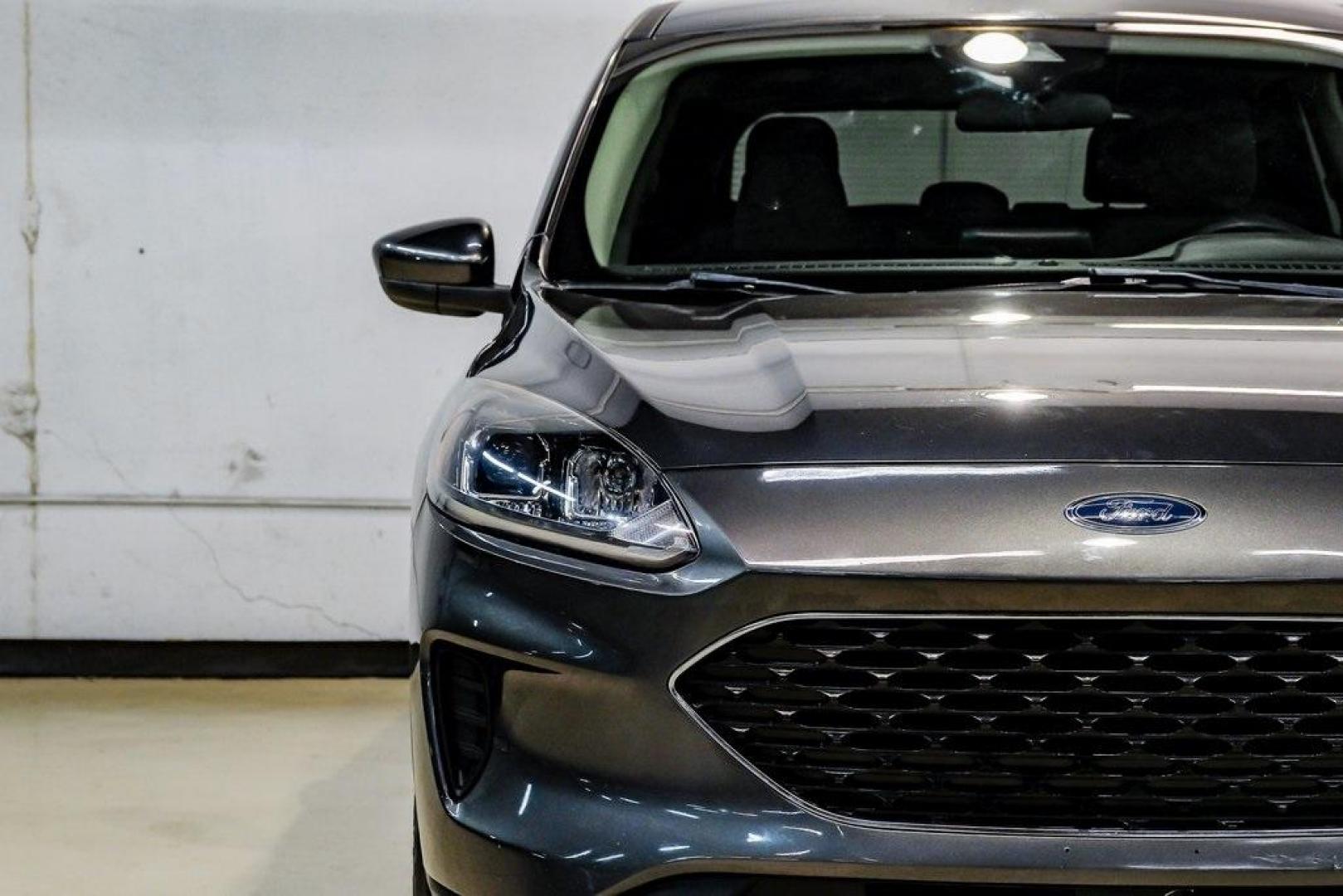 2020 Magnetic /Ebony Ford Escape SE (1FMCU0G64LU) with an 1.5L EcoBoost engine, Automatic transmission, located at 15300 Midway Rd., Addison, TX, 75001, (972) 702-0011, 32.958321, -96.838074 - Photo#53