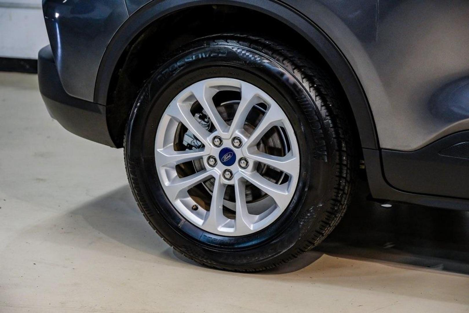 2020 Magnetic /Ebony Ford Escape SE (1FMCU0G64LU) with an 1.5L EcoBoost engine, Automatic transmission, located at 15300 Midway Rd., Addison, TX, 75001, (972) 702-0011, 32.958321, -96.838074 - Photo#60