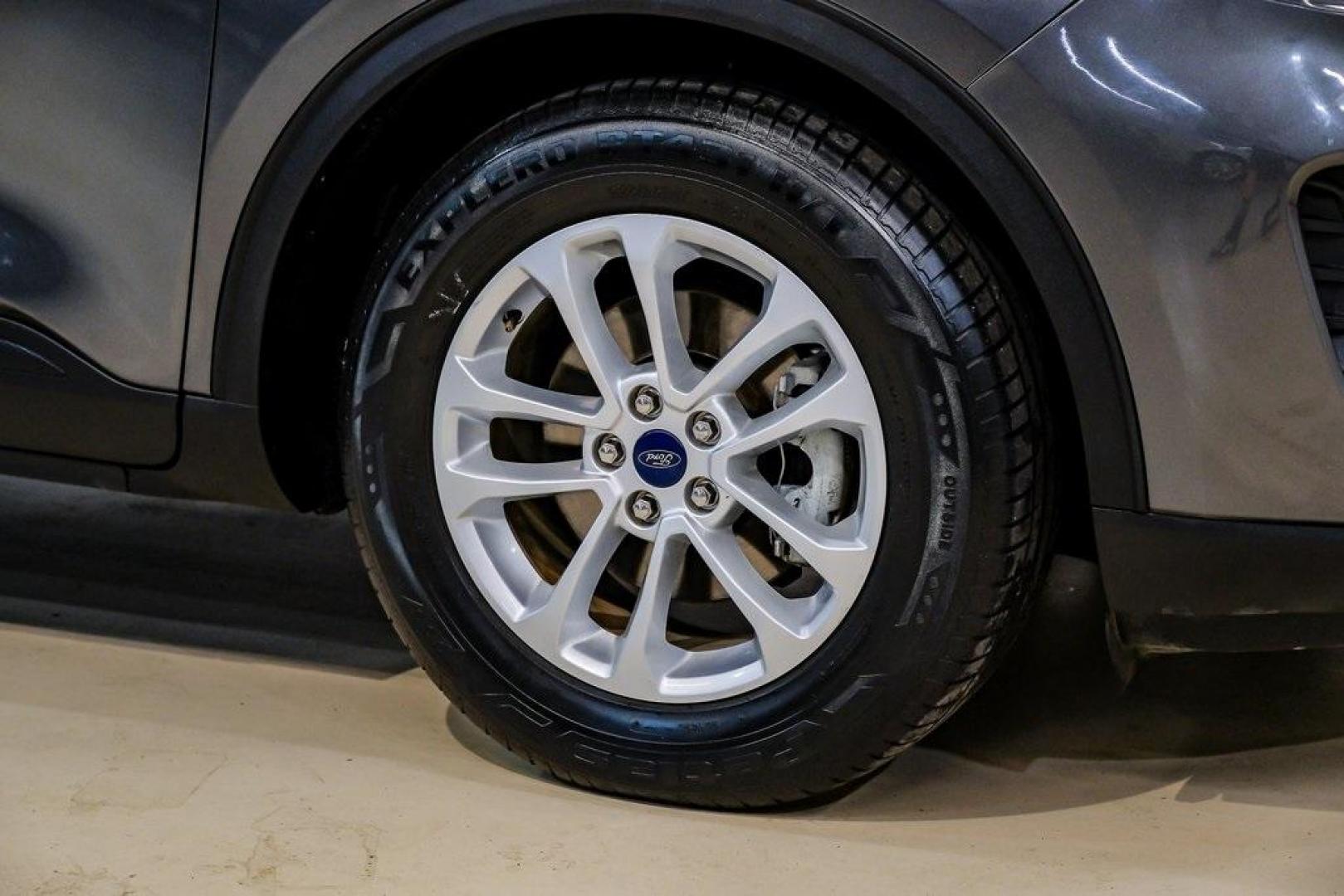 2020 Magnetic /Ebony Ford Escape SE (1FMCU0G64LU) with an 1.5L EcoBoost engine, Automatic transmission, located at 15300 Midway Rd., Addison, TX, 75001, (972) 702-0011, 32.958321, -96.838074 - Photo#61