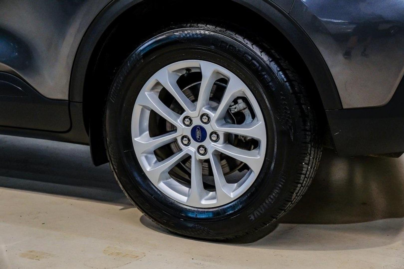 2020 Magnetic /Ebony Ford Escape SE (1FMCU0G64LU) with an 1.5L EcoBoost engine, Automatic transmission, located at 15300 Midway Rd., Addison, TX, 75001, (972) 702-0011, 32.958321, -96.838074 - Photo#63