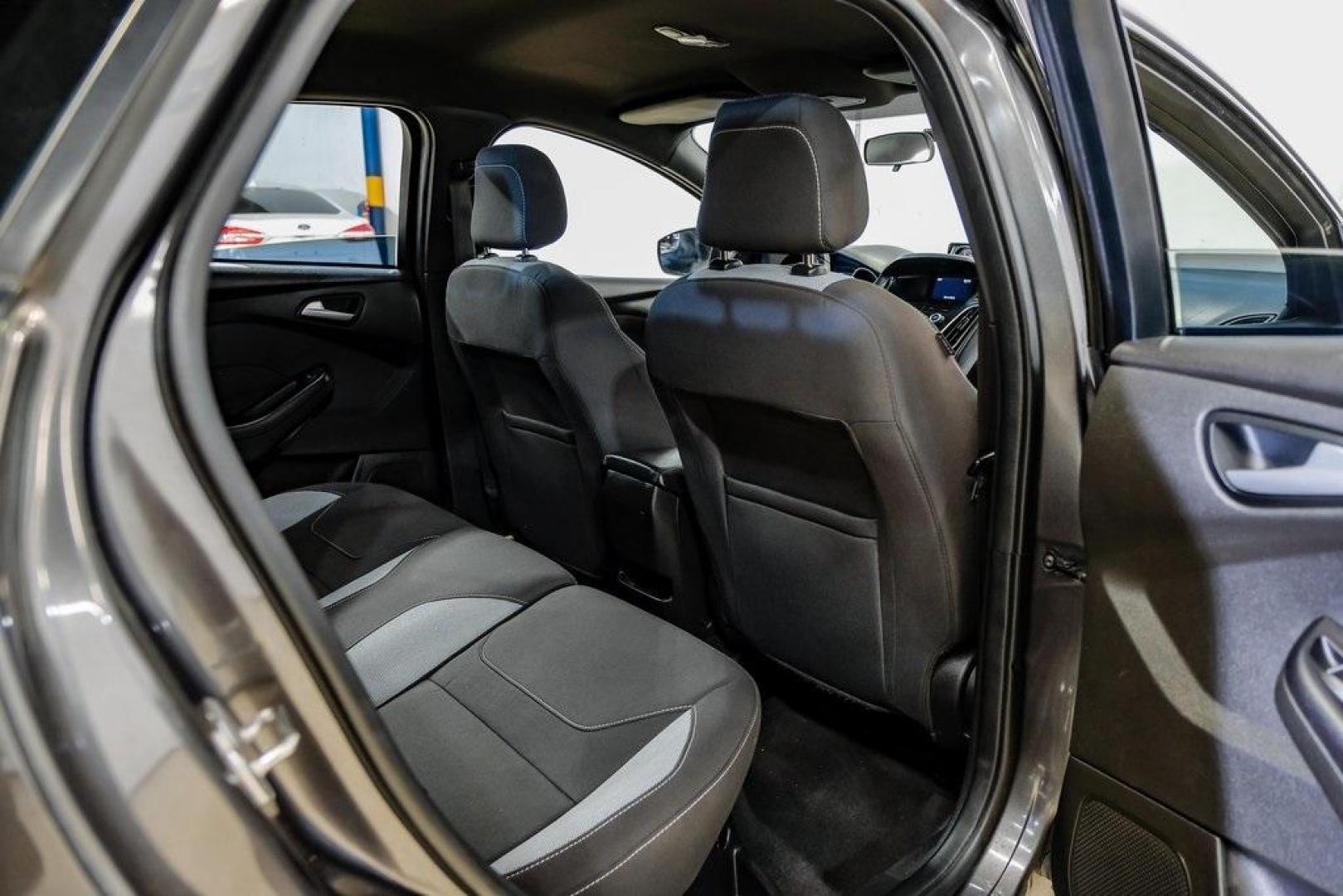 2015 Magnetic /Black Ford Focus ST (1FADP3L93FL) with an EcoBoost 2.0L I4 GTDi DOHC Turbocharged VCT engine, Manual transmission, located at 15300 Midway Rd., Addison, TX, 75001, (972) 702-0011, 32.958321, -96.838074 - Photo#41