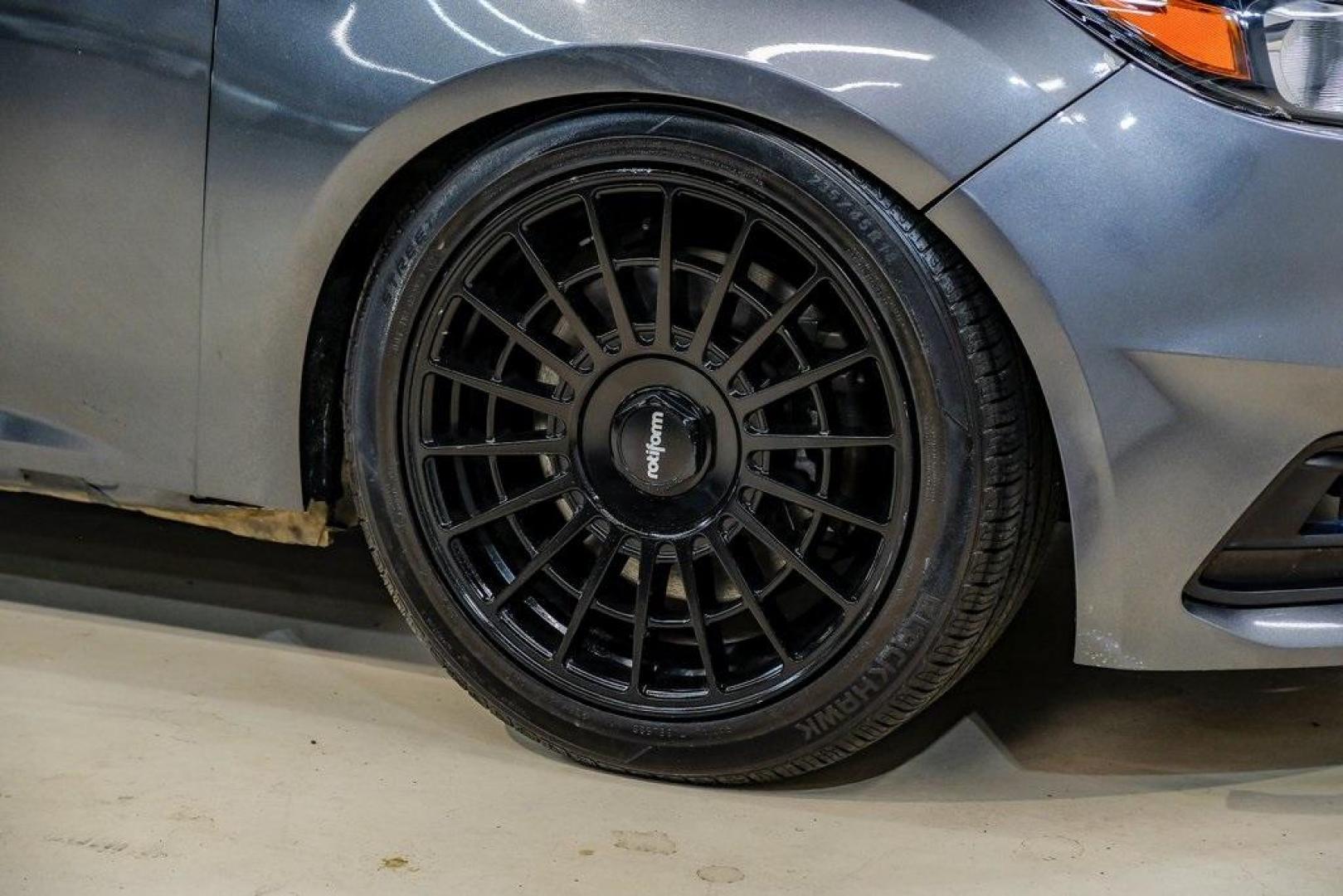 2015 Magnetic /Black Ford Focus ST (1FADP3L93FL) with an EcoBoost 2.0L I4 GTDi DOHC Turbocharged VCT engine, Manual transmission, located at 15300 Midway Rd., Addison, TX, 75001, (972) 702-0011, 32.958321, -96.838074 - Photo#59