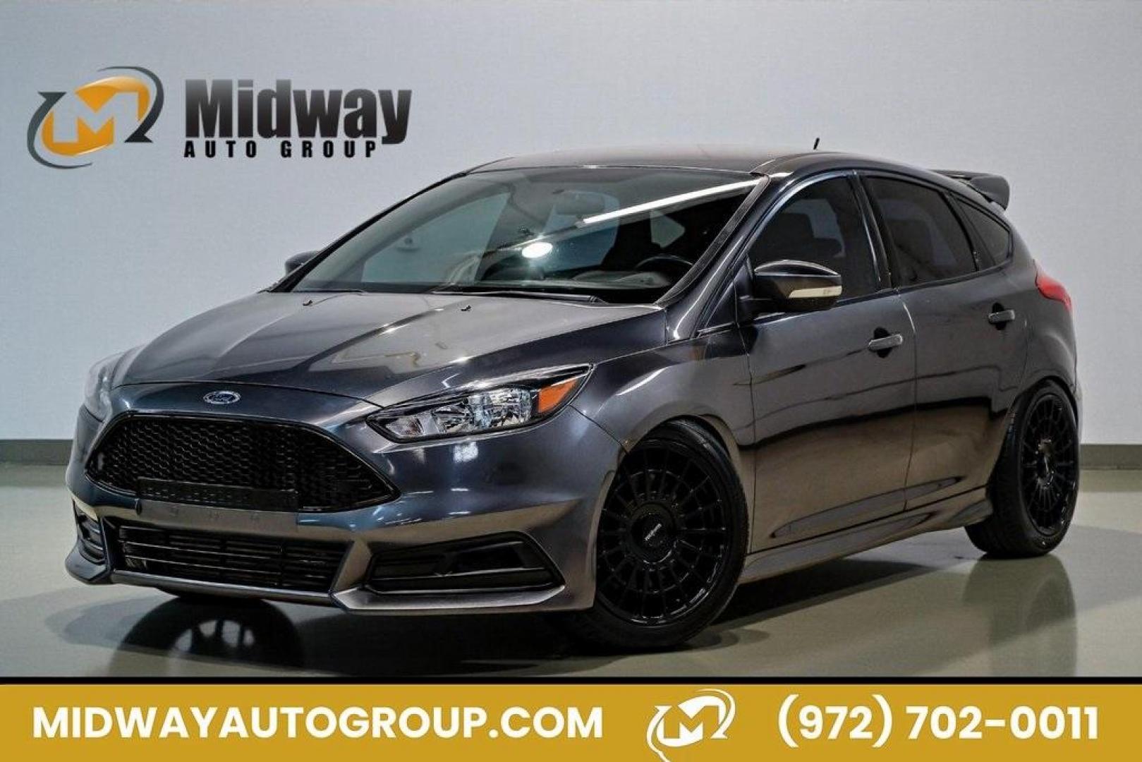 2015 Magnetic /Black Ford Focus ST (1FADP3L93FL) with an EcoBoost 2.0L I4 GTDi DOHC Turbocharged VCT engine, Manual transmission, located at 15300 Midway Rd., Addison, TX, 75001, (972) 702-0011, 32.958321, -96.838074 - Photo#0