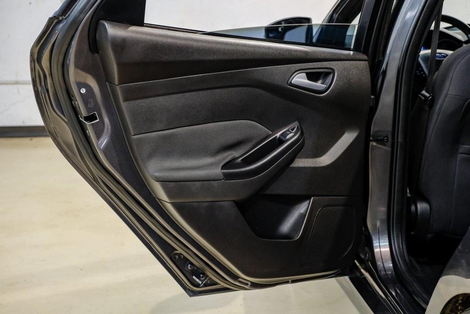 2015 Magnetic /Black Ford Focus ST (1FADP3L93FL) with an EcoBoost 2.0L I4 GTDi DOHC Turbocharged VCT engine, Manual transmission, located at 15300 Midway Rd., Addison, TX, 75001, (972) 702-0011, 32.958321, -96.838074 - Photo#49