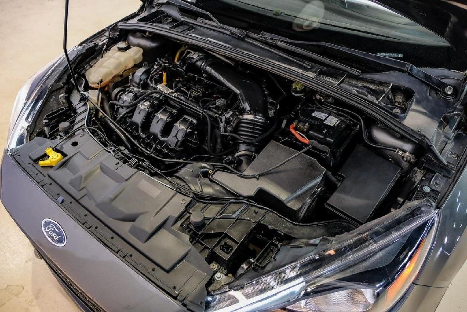 2015 Magnetic /Black Ford Focus ST (1FADP3L93FL) with an EcoBoost 2.0L I4 GTDi DOHC Turbocharged VCT engine, Manual transmission, located at 15300 Midway Rd., Addison, TX, 75001, (972) 702-0011, 32.958321, -96.838074 - Photo#53