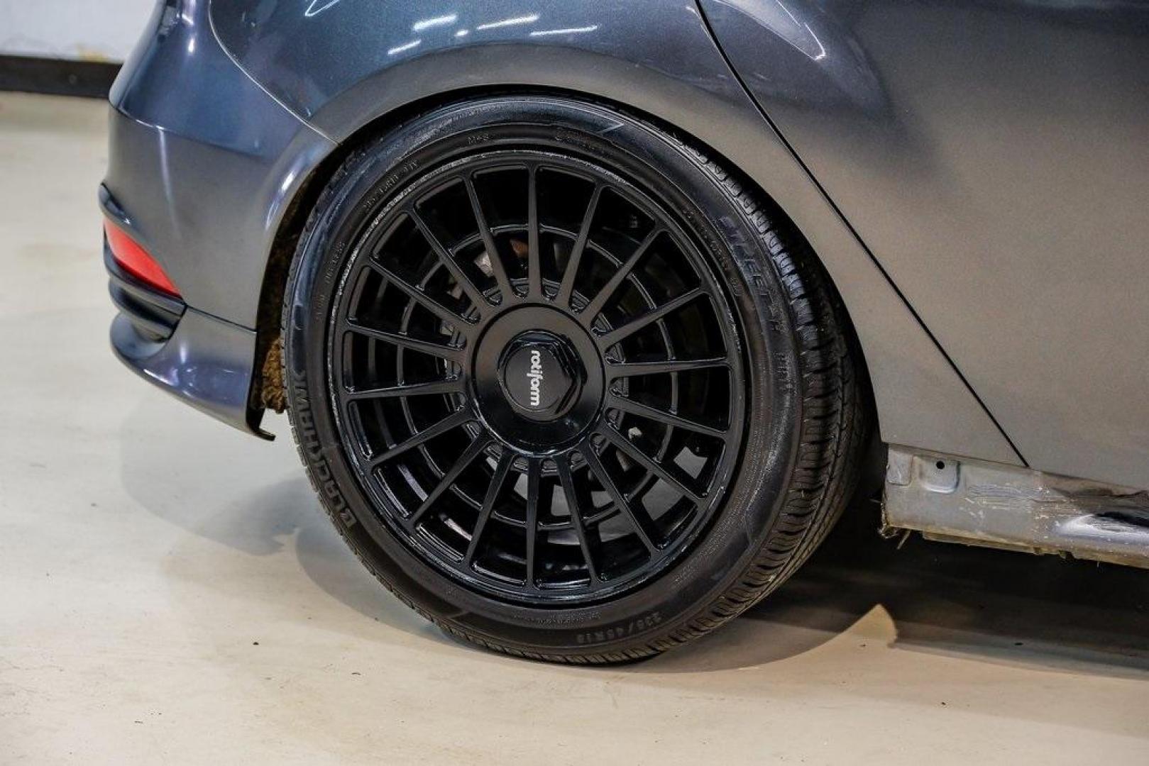 2015 Magnetic /Black Ford Focus ST (1FADP3L93FL) with an EcoBoost 2.0L I4 GTDi DOHC Turbocharged VCT engine, Manual transmission, located at 15300 Midway Rd., Addison, TX, 75001, (972) 702-0011, 32.958321, -96.838074 - Photo#58