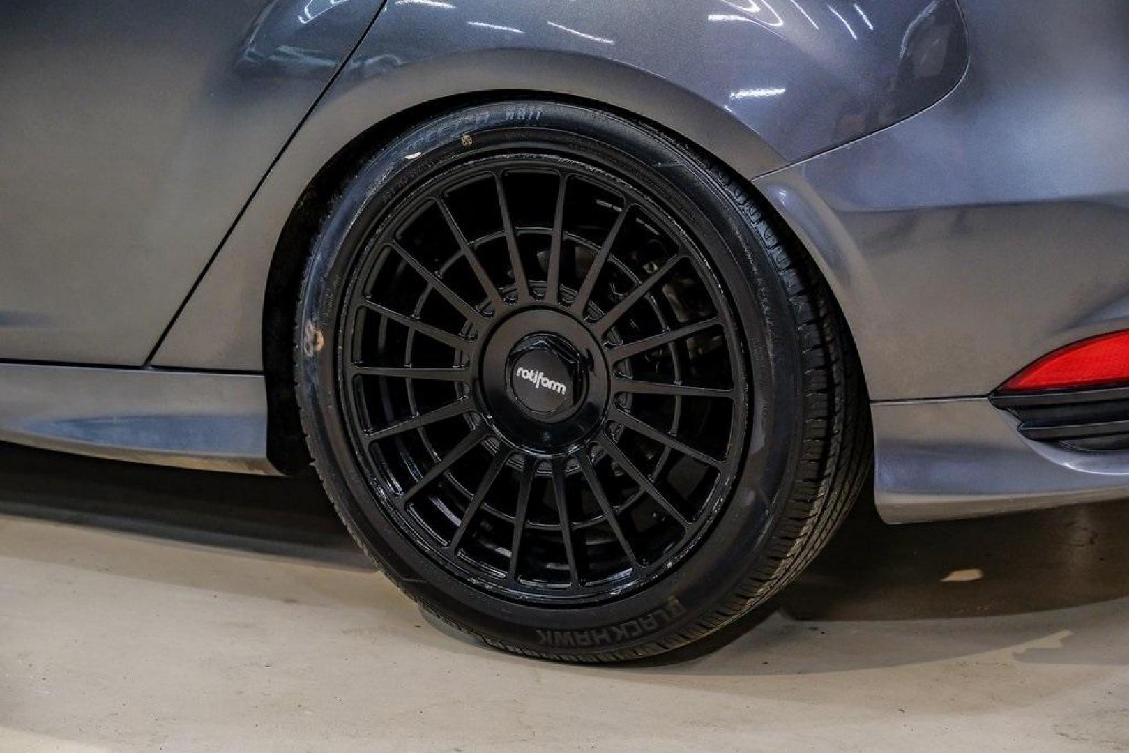 2015 Magnetic /Black Ford Focus ST (1FADP3L93FL) with an EcoBoost 2.0L I4 GTDi DOHC Turbocharged VCT engine, Manual transmission, located at 15300 Midway Rd., Addison, TX, 75001, (972) 702-0011, 32.958321, -96.838074 - Photo#61