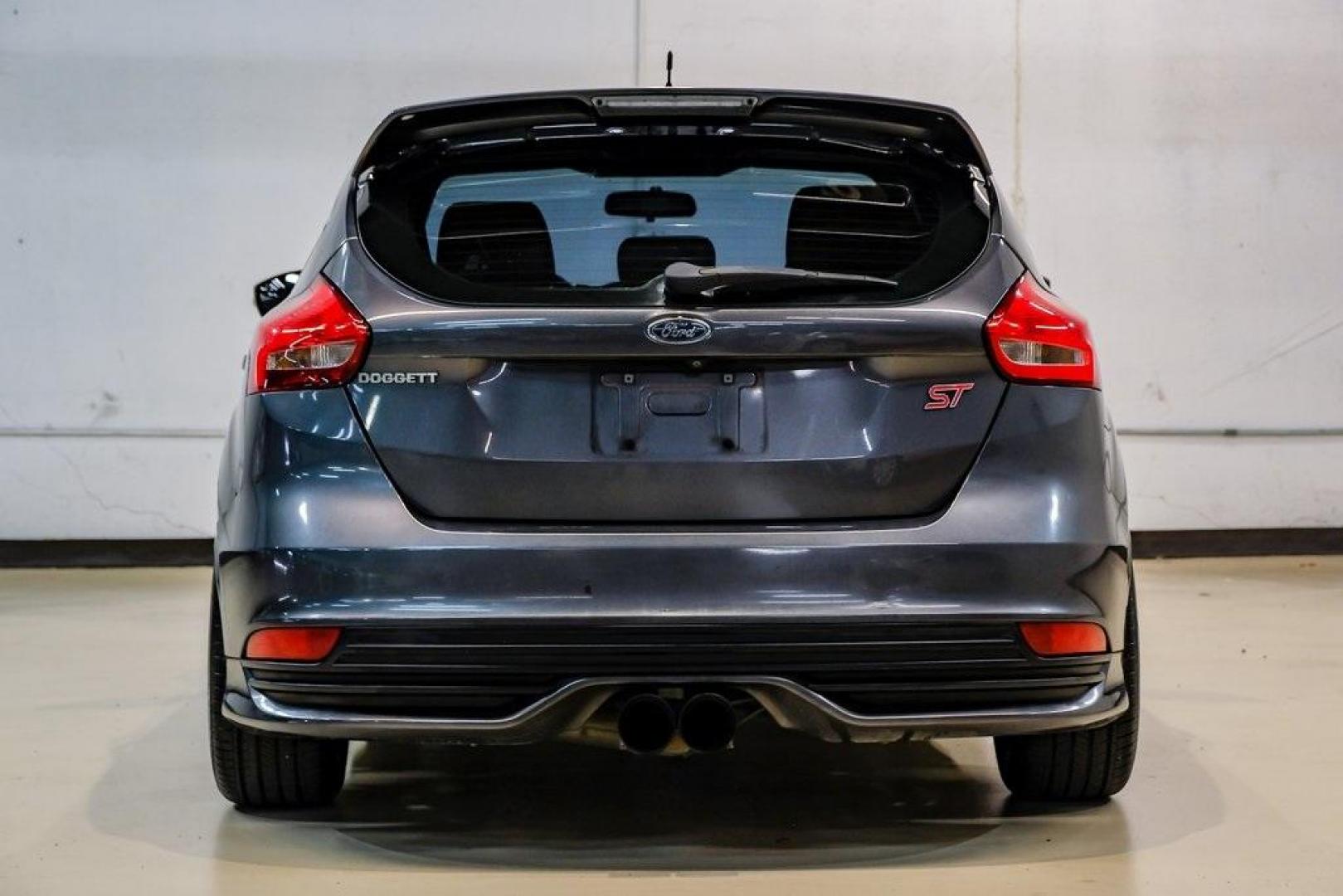 2015 Magnetic /Black Ford Focus ST (1FADP3L93FL) with an EcoBoost 2.0L I4 GTDi DOHC Turbocharged VCT engine, Manual transmission, located at 15300 Midway Rd., Addison, TX, 75001, (972) 702-0011, 32.958321, -96.838074 - 2015 Ford Focus ST<br><br>Now Available at Midway Auto Group, Addison, Texas<br><br>Sporty, aggressive, and built for enthusiasts the 2015 Ford Focus ST delivers turbocharged performance, sharp handling, and a driver-focused interior that sets it apart from traditional compact cars. With its signatu - Photo#12