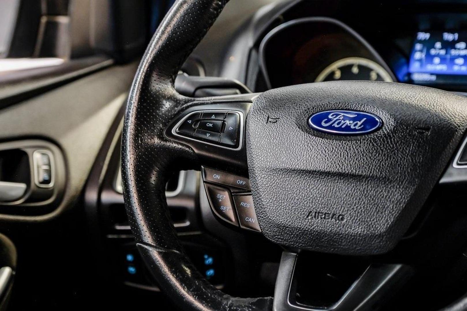 2015 Magnetic /Black Ford Focus ST (1FADP3L93FL) with an EcoBoost 2.0L I4 GTDi DOHC Turbocharged VCT engine, Manual transmission, located at 15300 Midway Rd., Addison, TX, 75001, (972) 702-0011, 32.958321, -96.838074 - 2015 Ford Focus ST<br><br>Now Available at Midway Auto Group, Addison, Texas<br><br>Sporty, aggressive, and built for enthusiasts the 2015 Ford Focus ST delivers turbocharged performance, sharp handling, and a driver-focused interior that sets it apart from traditional compact cars. With its signatu - Photo#21