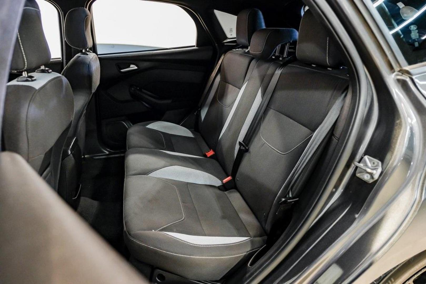 2015 Magnetic /Black Ford Focus ST (1FADP3L93FL) with an EcoBoost 2.0L I4 GTDi DOHC Turbocharged VCT engine, Manual transmission, located at 15300 Midway Rd., Addison, TX, 75001, (972) 702-0011, 32.958321, -96.838074 - 2015 Ford Focus ST<br><br>Now Available at Midway Auto Group, Addison, Texas<br><br>Sporty, aggressive, and built for enthusiasts the 2015 Ford Focus ST delivers turbocharged performance, sharp handling, and a driver-focused interior that sets it apart from traditional compact cars. With its signatu - Photo#43